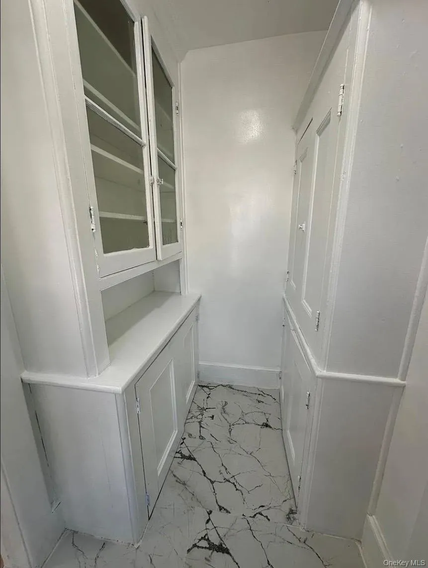 Built ins off kitchen area Built ins off kitchen area