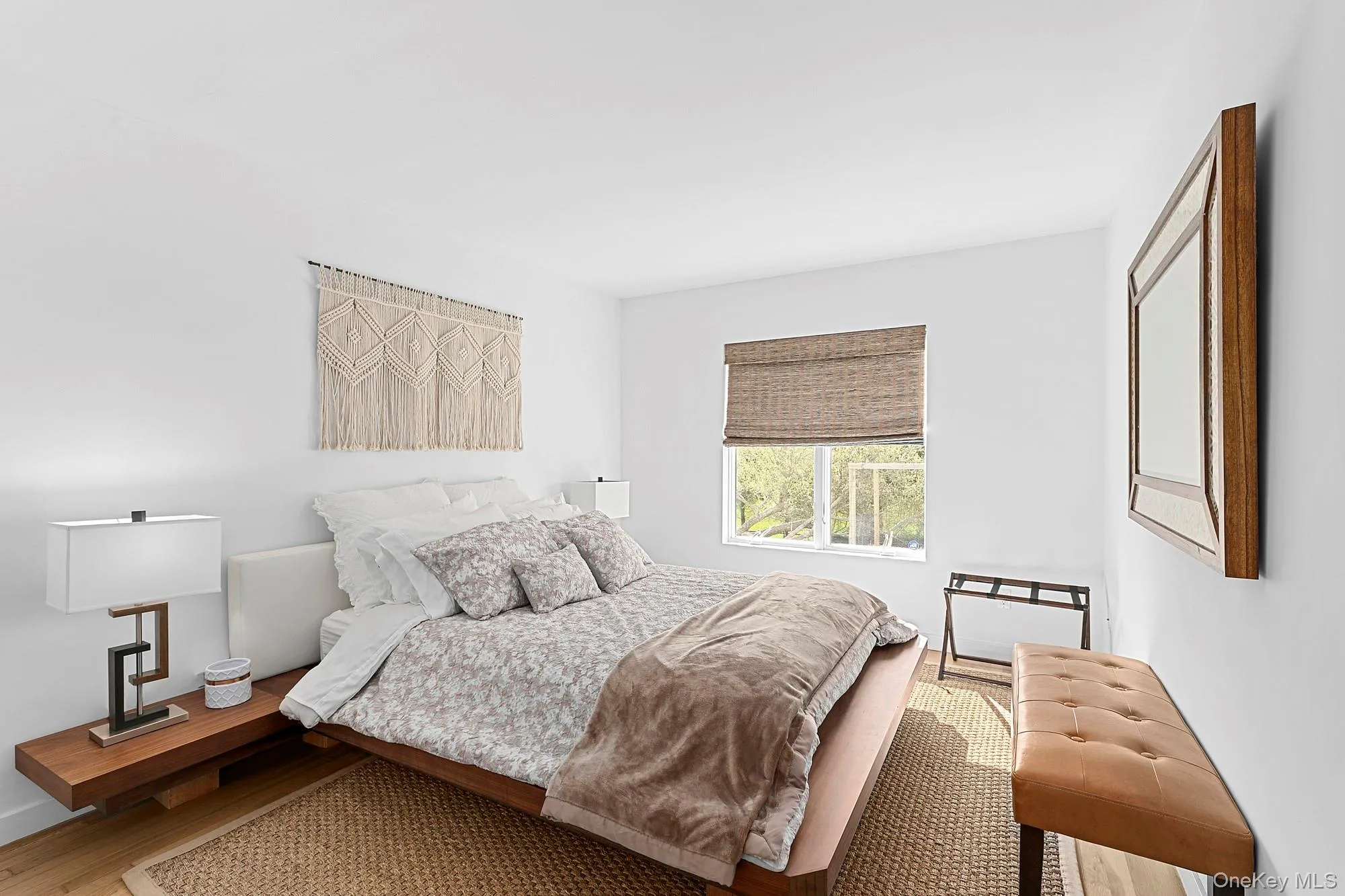 Bedroom featuring wood finished floors Bedroom featuring wood finished floors