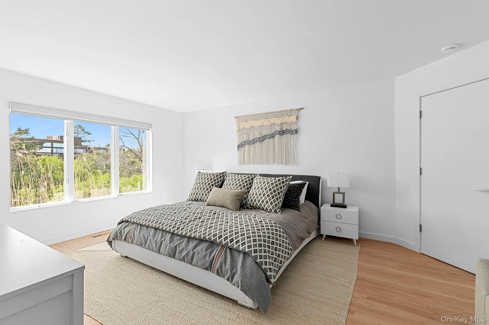 Bedroom featuring light wood-style floors Bedroom featuring light wood-style floors