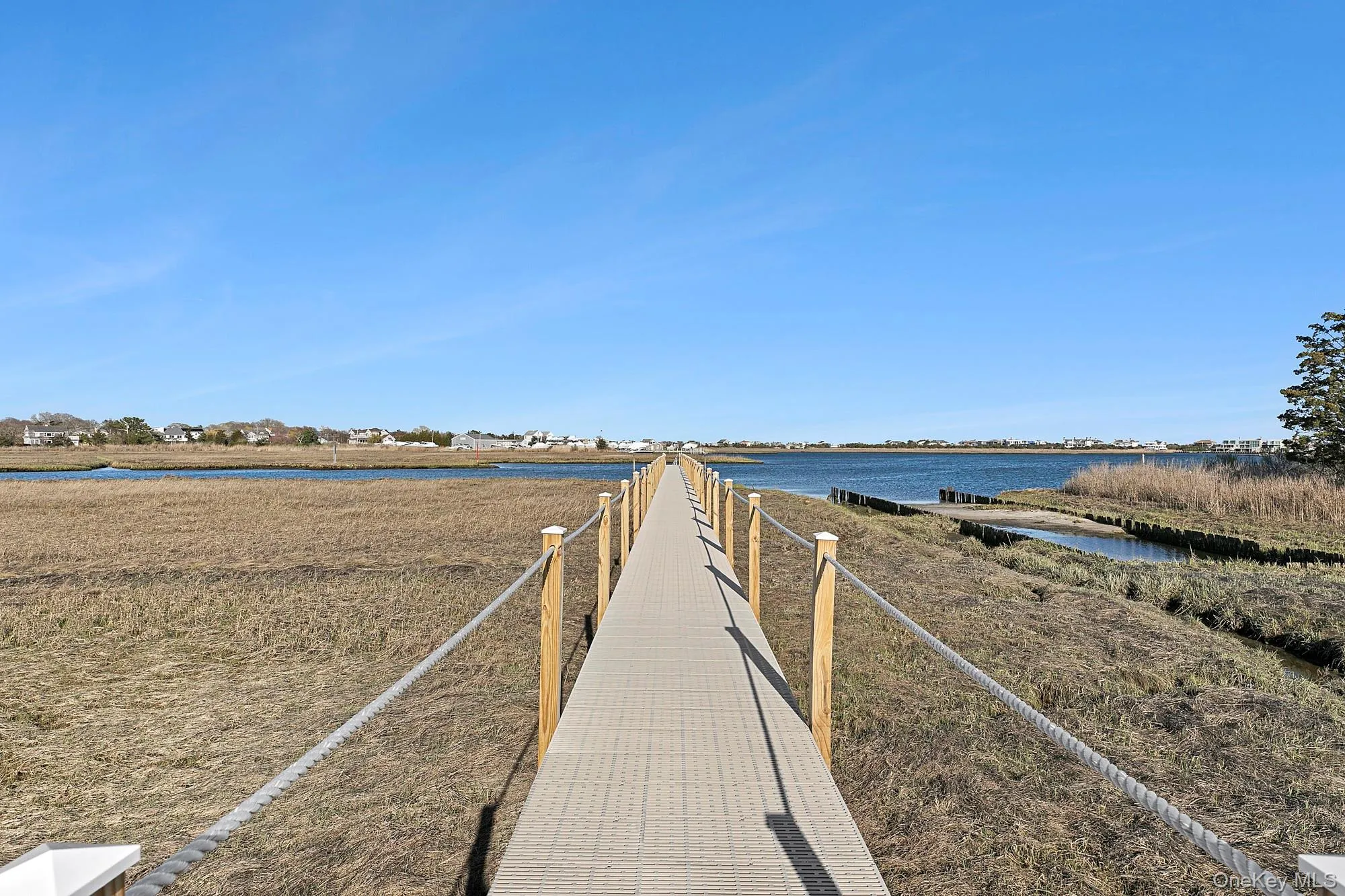 Surrounding community featuring a water view Surrounding community featuring a water view