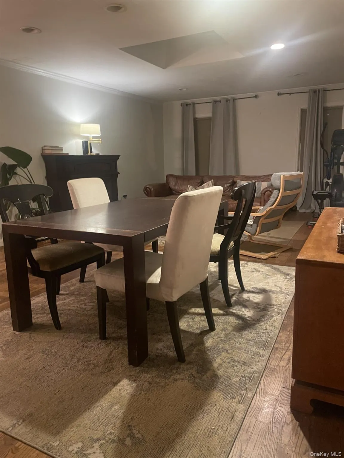 Dining area with crown molding and recessed lighting Dining area with crown molding and recessed lighting
