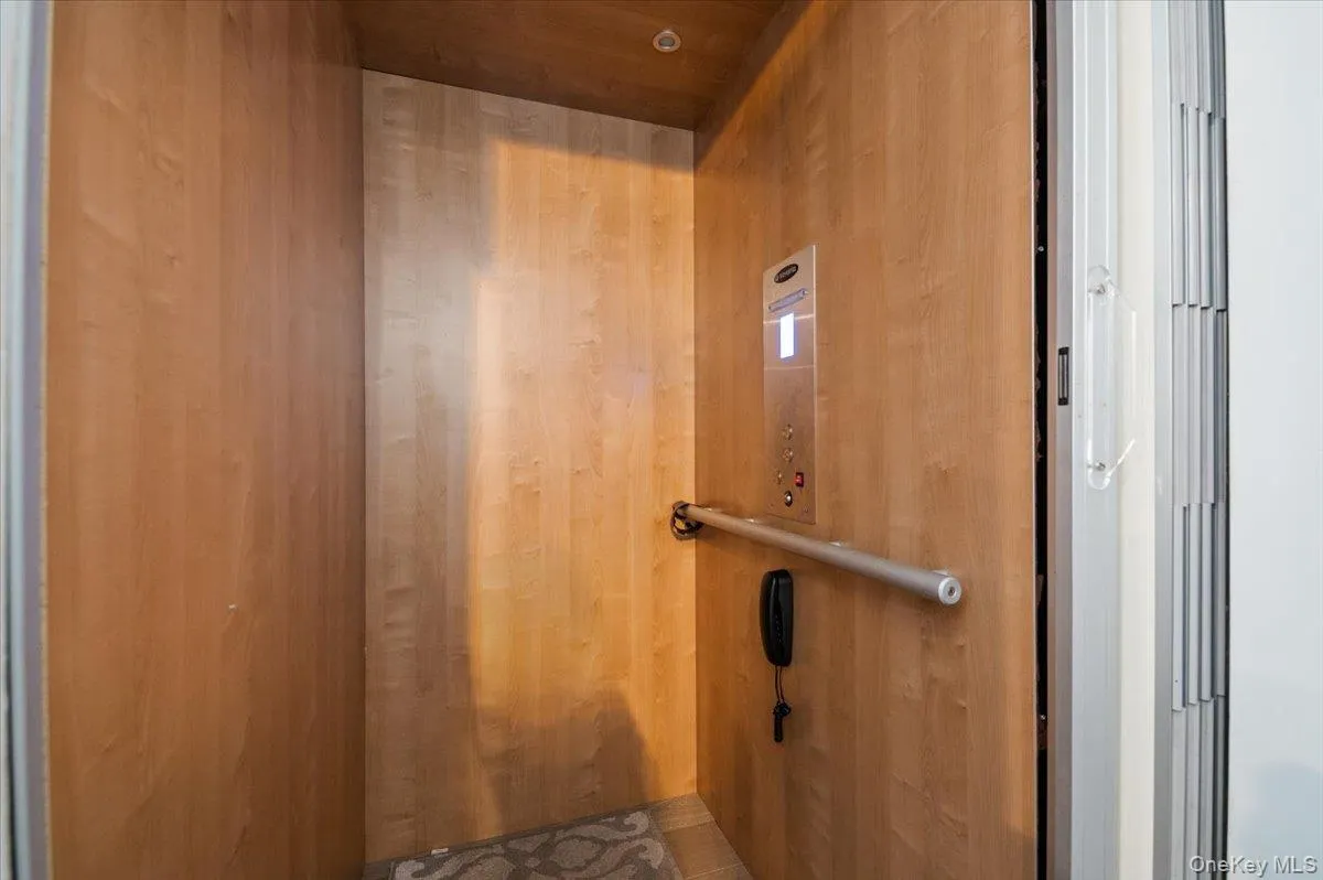 Elevator with wooden walls and wooden ceiling Elevator with wooden walls and wooden ceiling