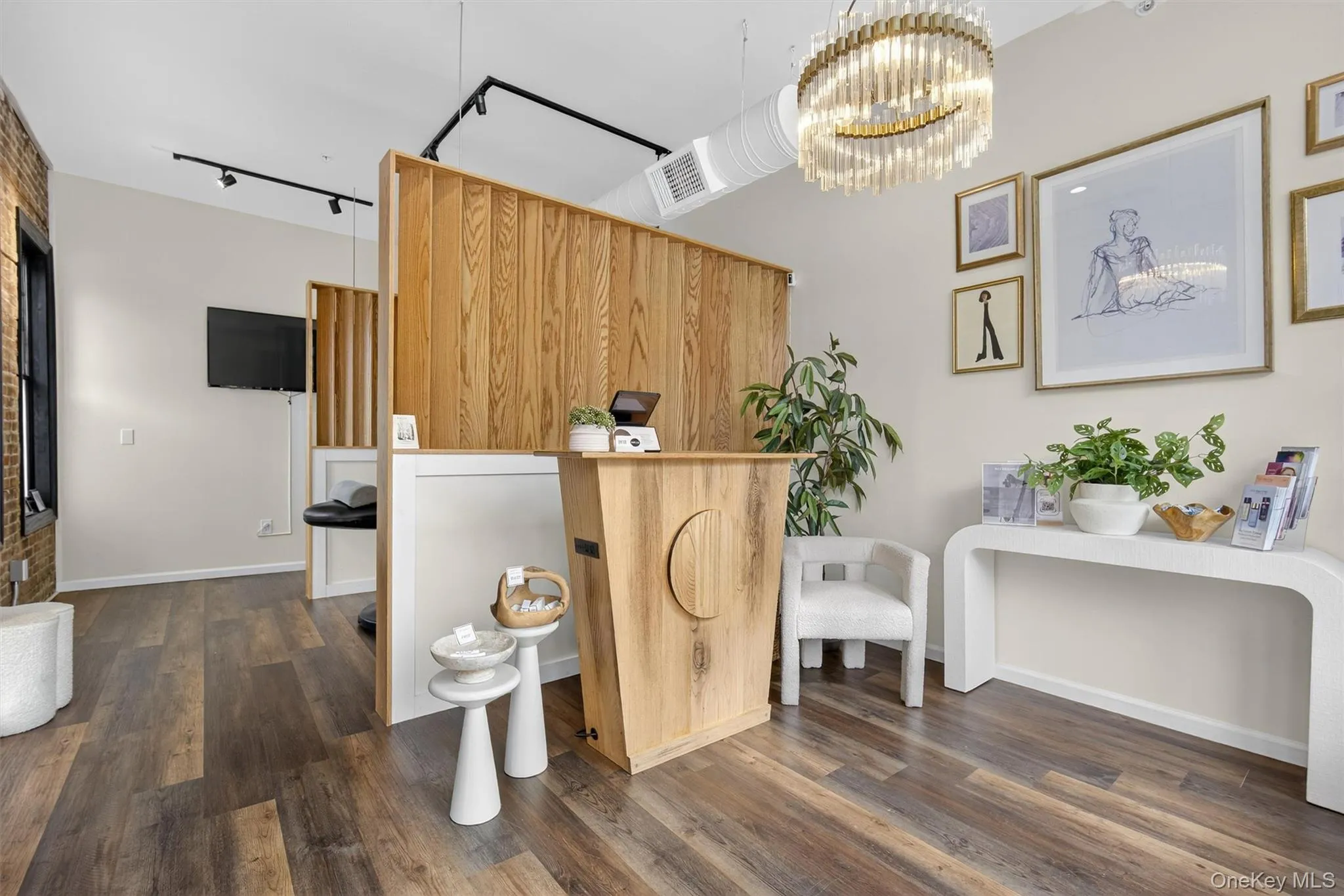 Reception area featuring a chandelier Reception area featuring a chandelier
