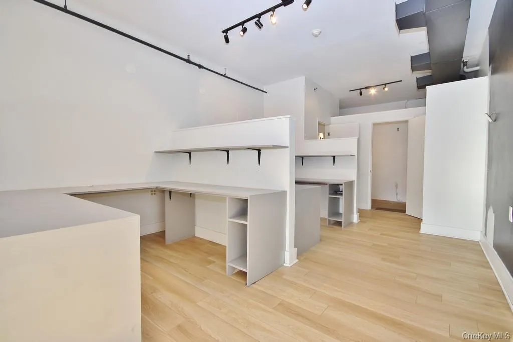 Kitchen featuring light wood-style flooring Kitchen featuring light wood-style flooring