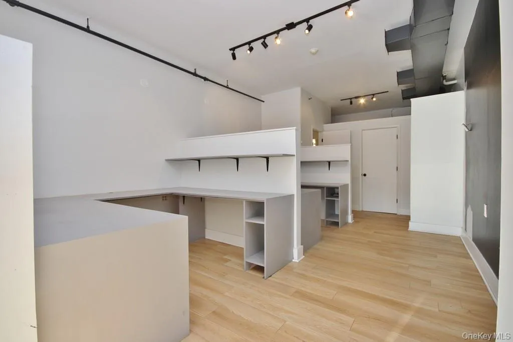 Kitchen with light wood finished floors Kitchen with light wood finished floors