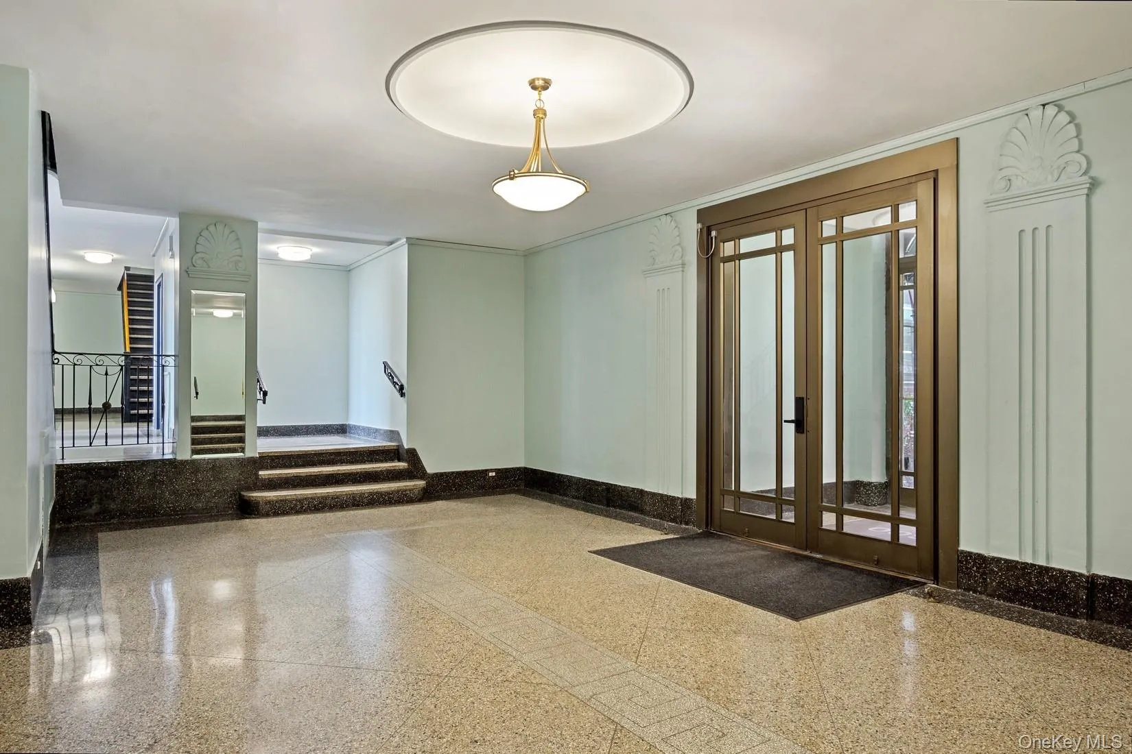 Lobby featuring stairs Lobby featuring stairs