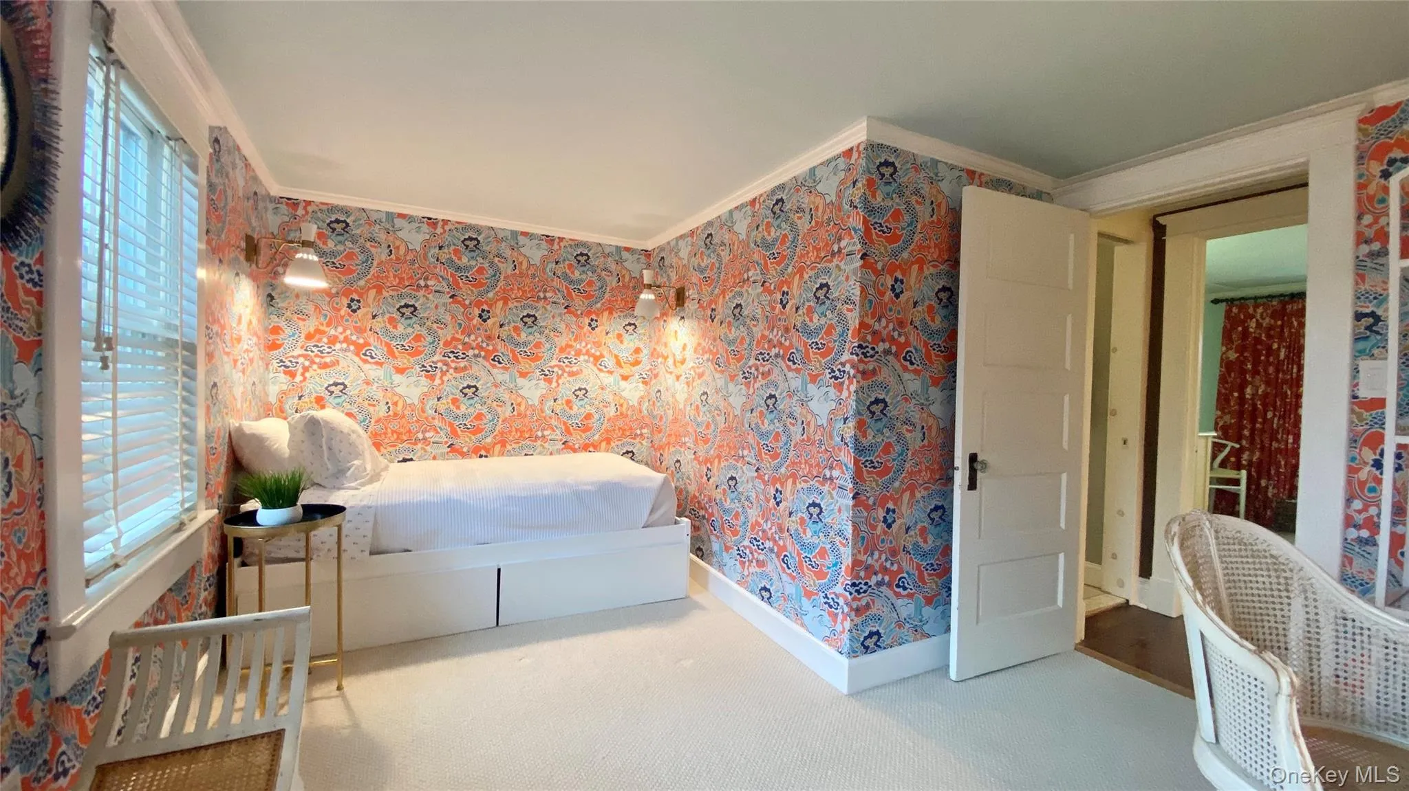 Bedroom with carpet flooring and crown molding Bedroom with carpet flooring and crown molding