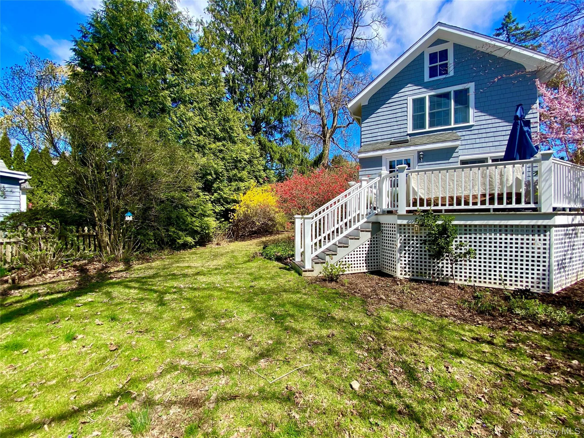 View of yard featuring a wooden deck View of yard featuring a wooden deck