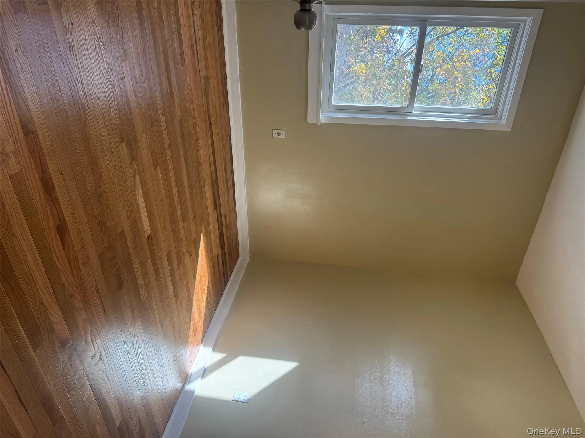 Empty room with wood-type flooring Empty room with wood-type flooring