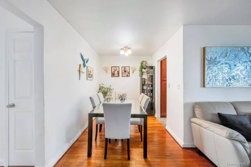 Dining space featuring hardwood / wood-style floors Dining space featuring hardwood / wood-style floors