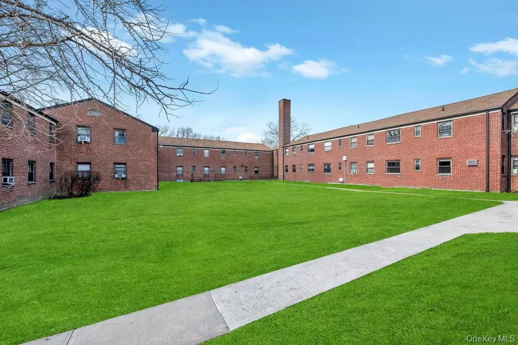 Surrounding community featuring a yard Surrounding community featuring a yard