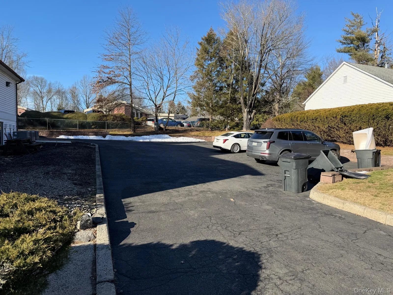 View of street featuring curbs and a residential view View of street featuring curbs and a residential view