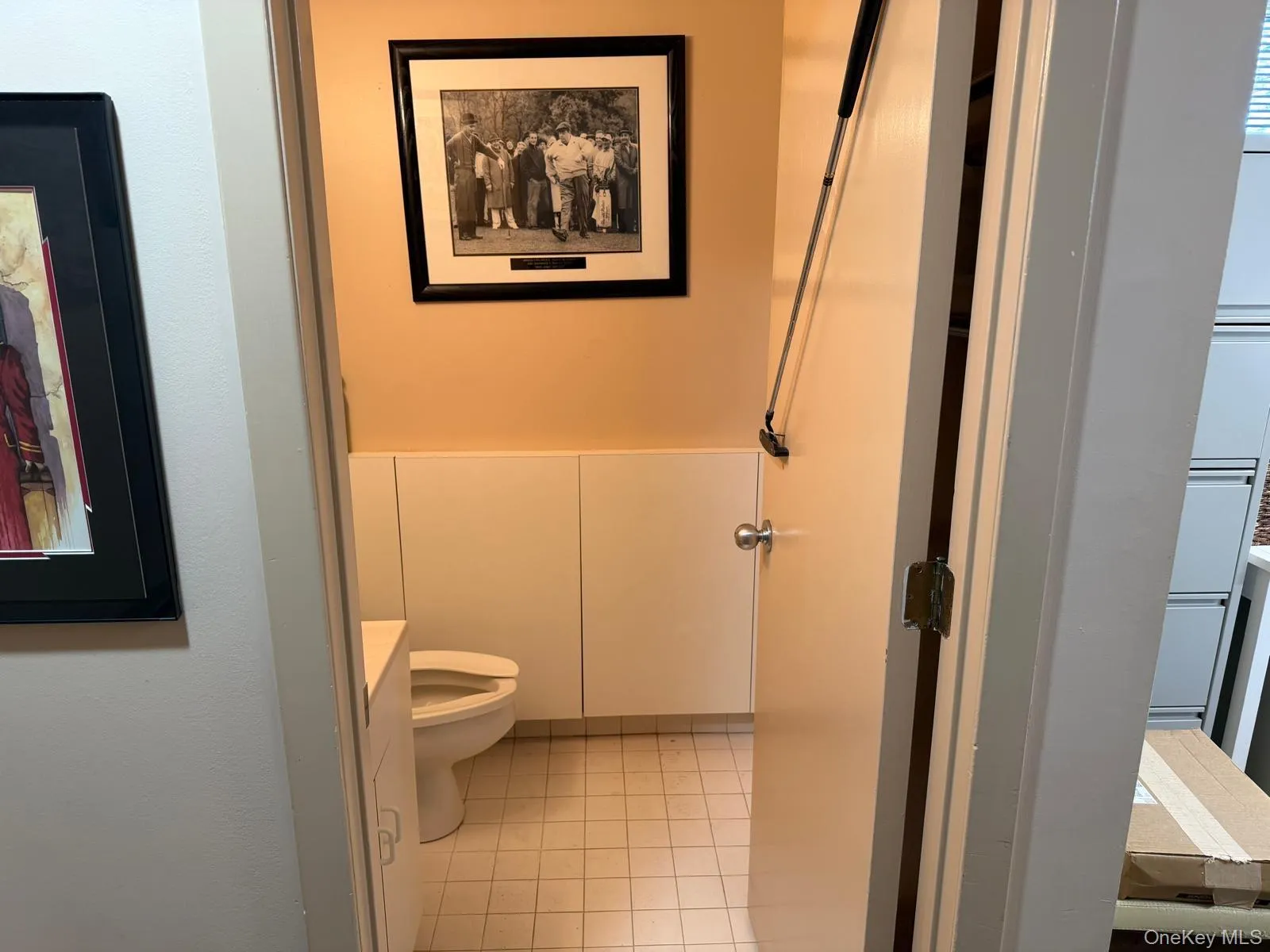 Bathroom with light tile patterned flooring and vanity Bathroom with light tile patterned flooring and vanity