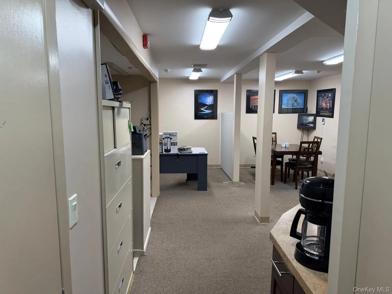 Corridor featuring light colored carpet Corridor featuring light colored carpet