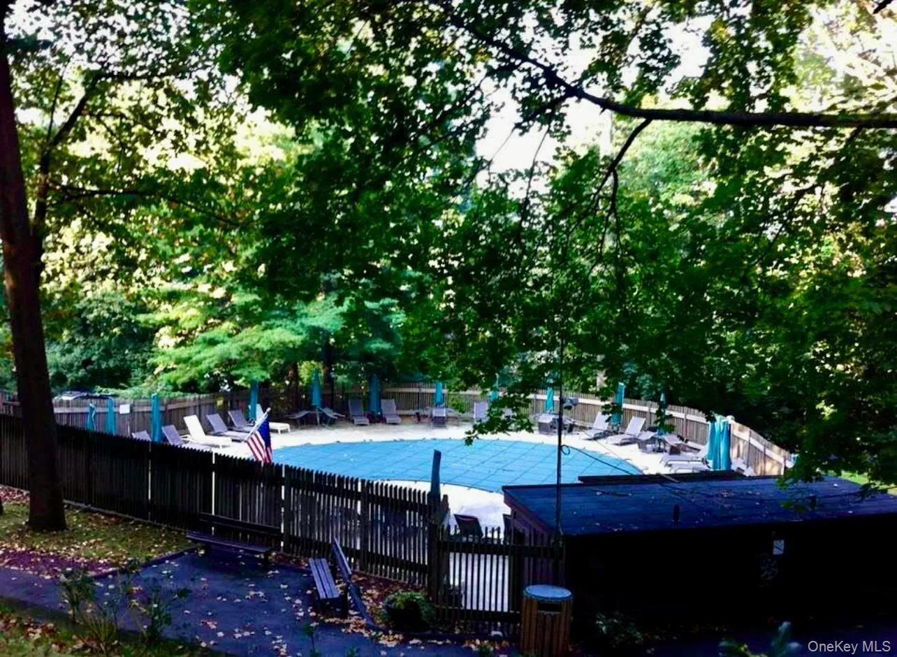 Community pool with a patio Community pool with a patio