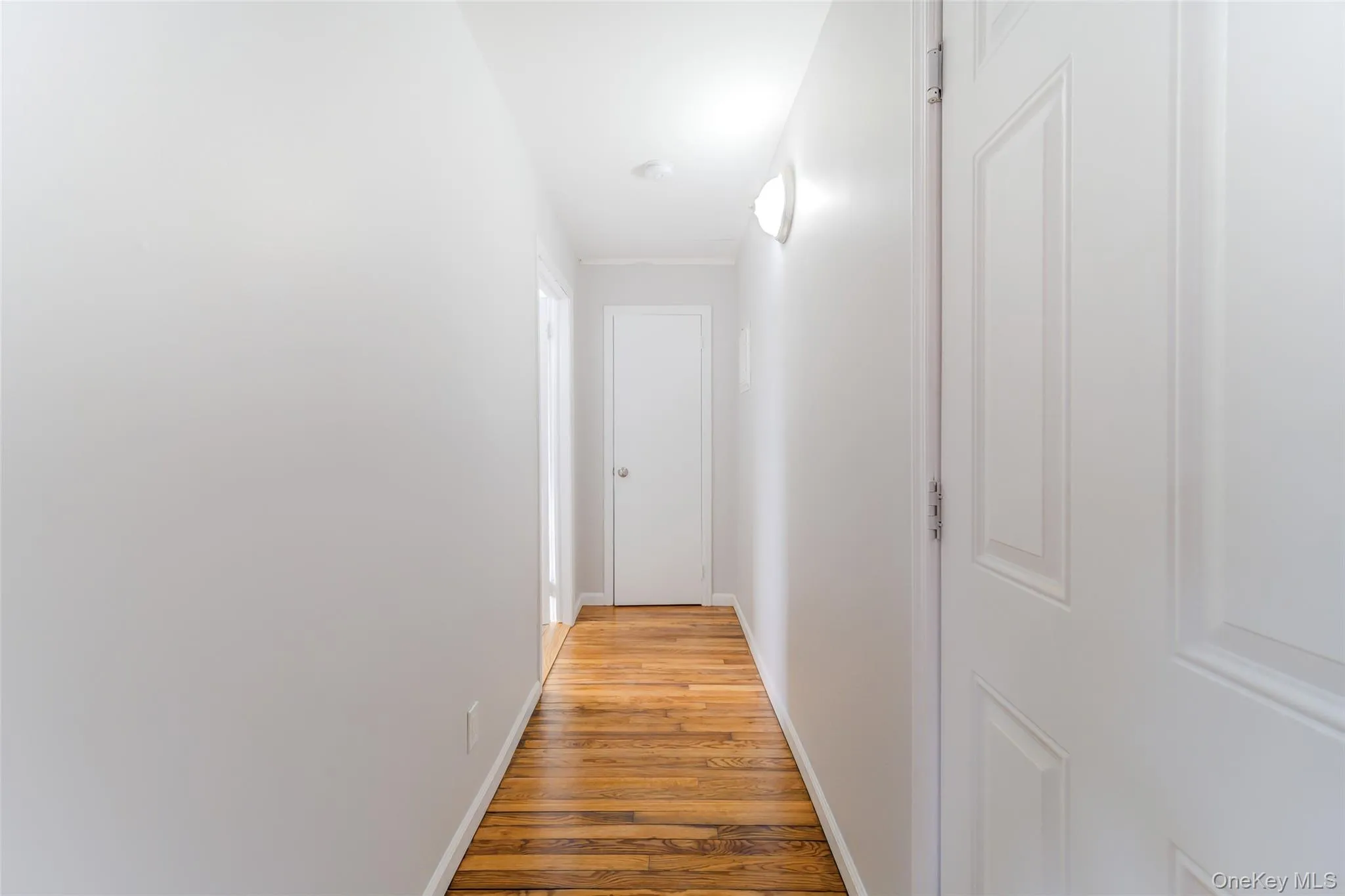 Corridor leading to closet and bathroom. Corridor leading to closet and bathroom.