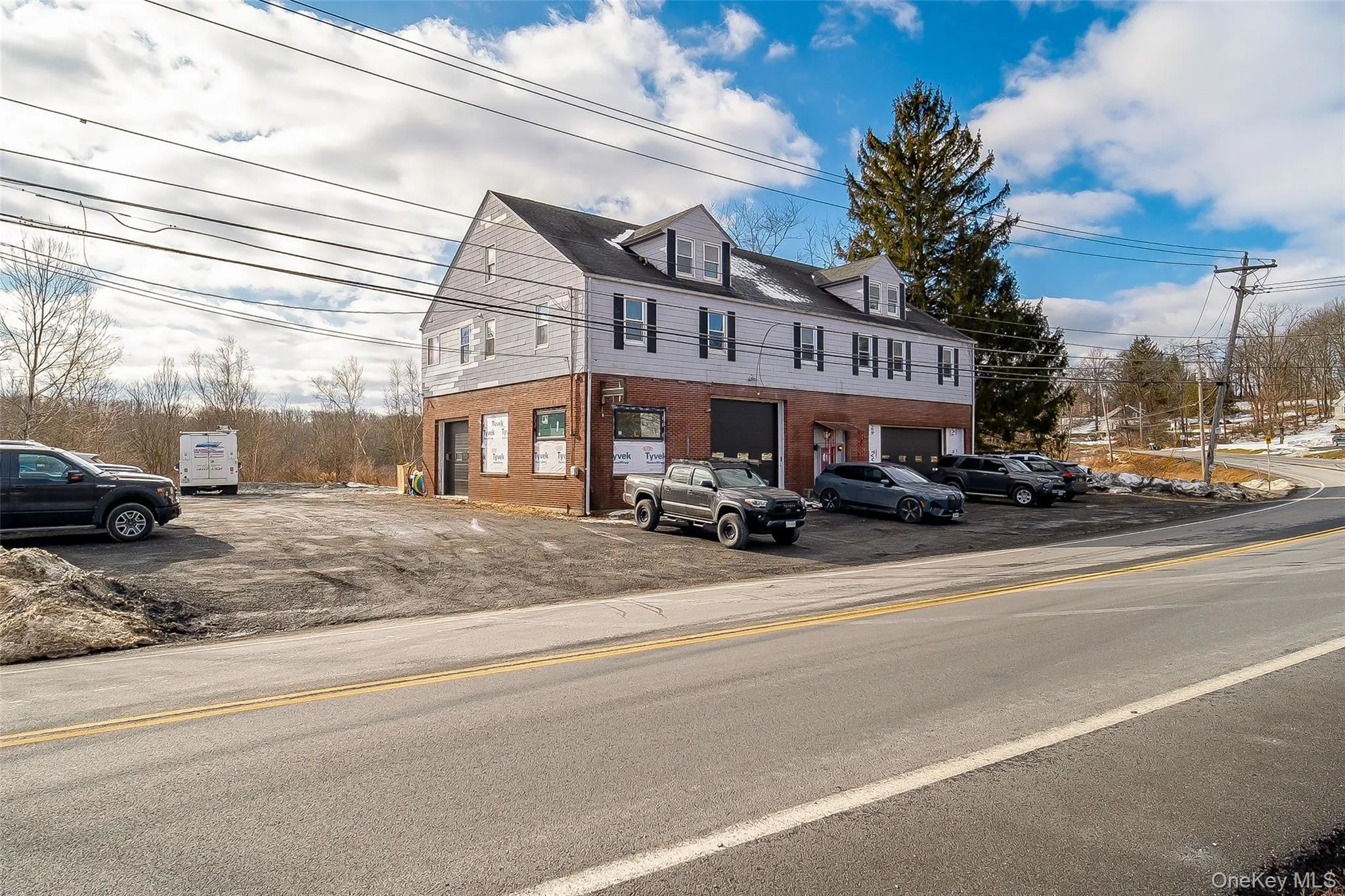 View of side of property with brick siding View of side of property with brick siding
