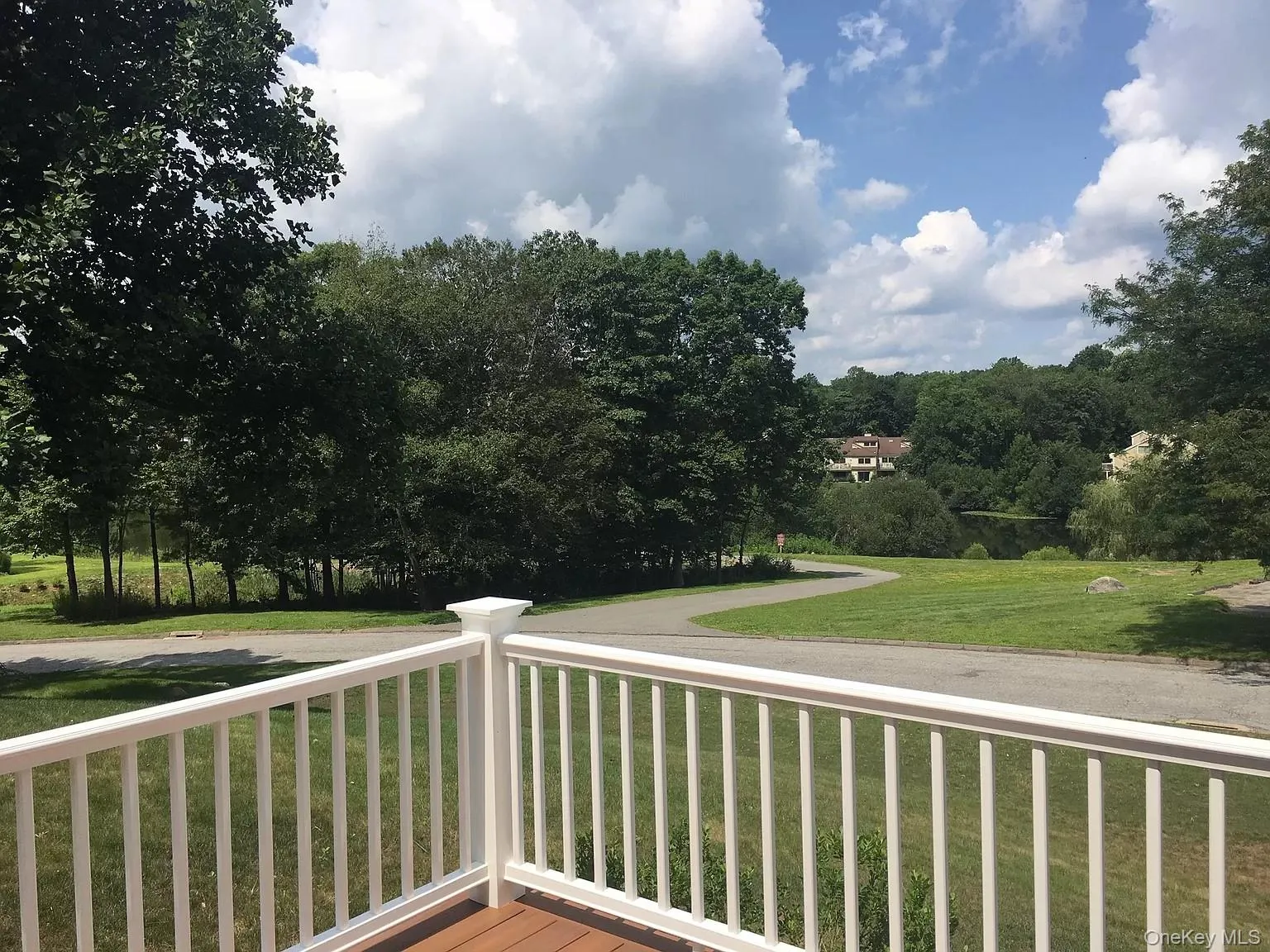 Deck featuring a yard Deck featuring a yard