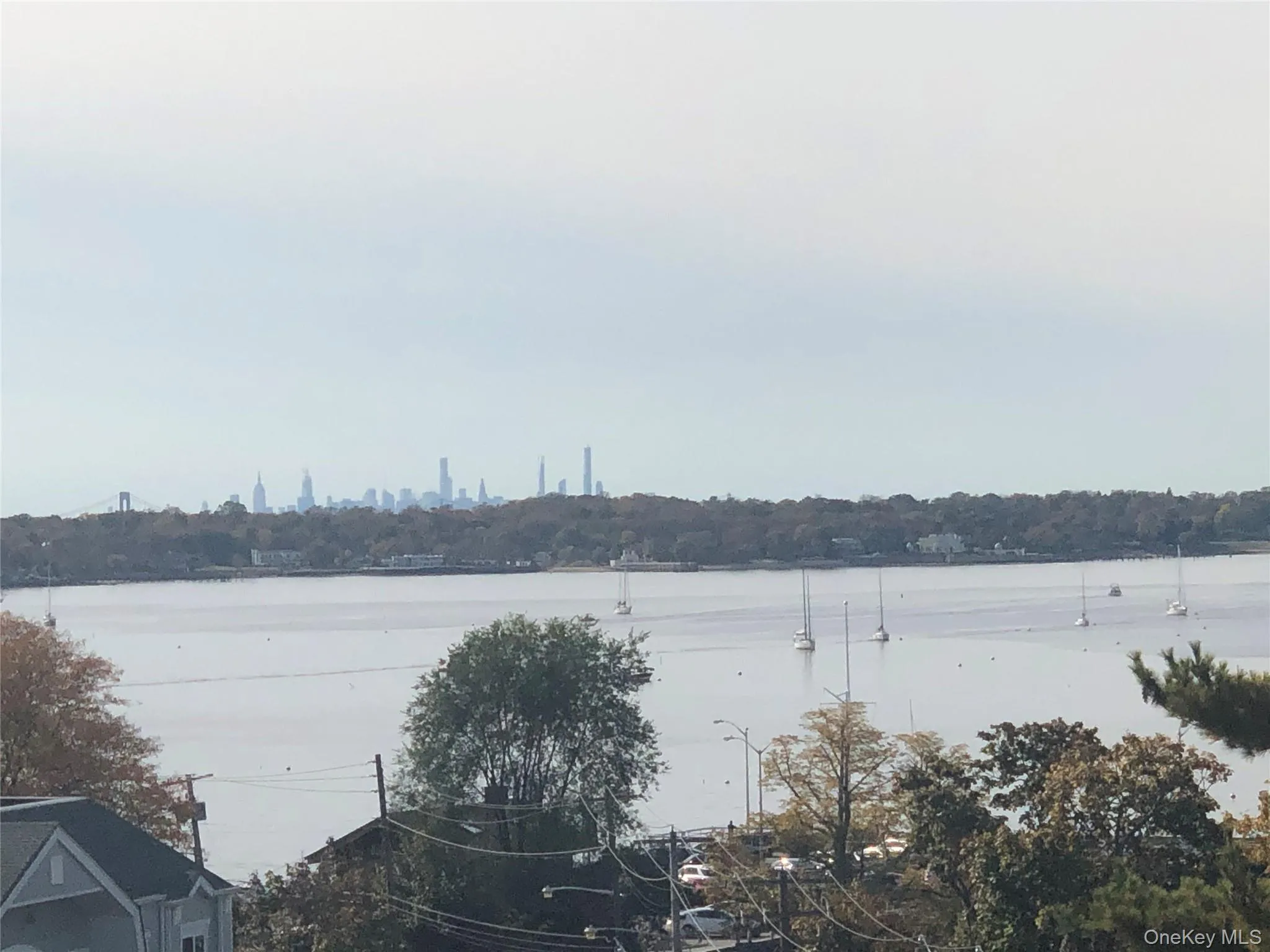 Water view featuring city skyline Water view featuring city skyline