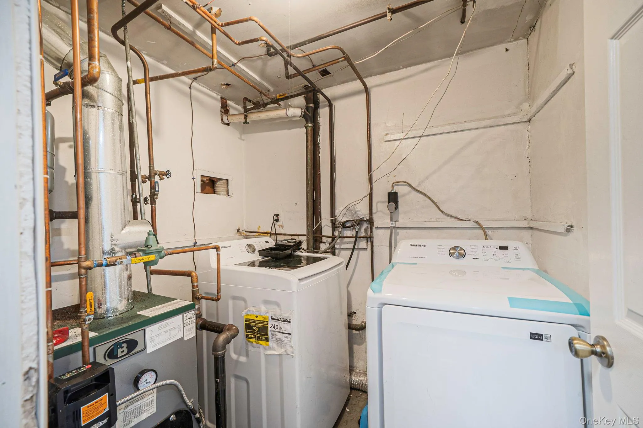 Lower Level Utility Room with Laundry Lower Level Utility Room with Laundry