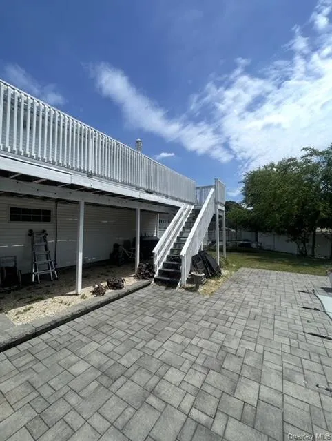 Upper Deck leading to paver patio Upper Deck leading to paver patio