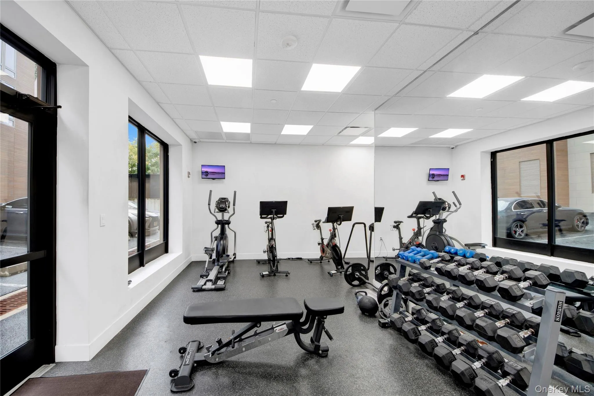 Exercise room featuring a paneled ceiling Exercise room featuring a paneled ceiling