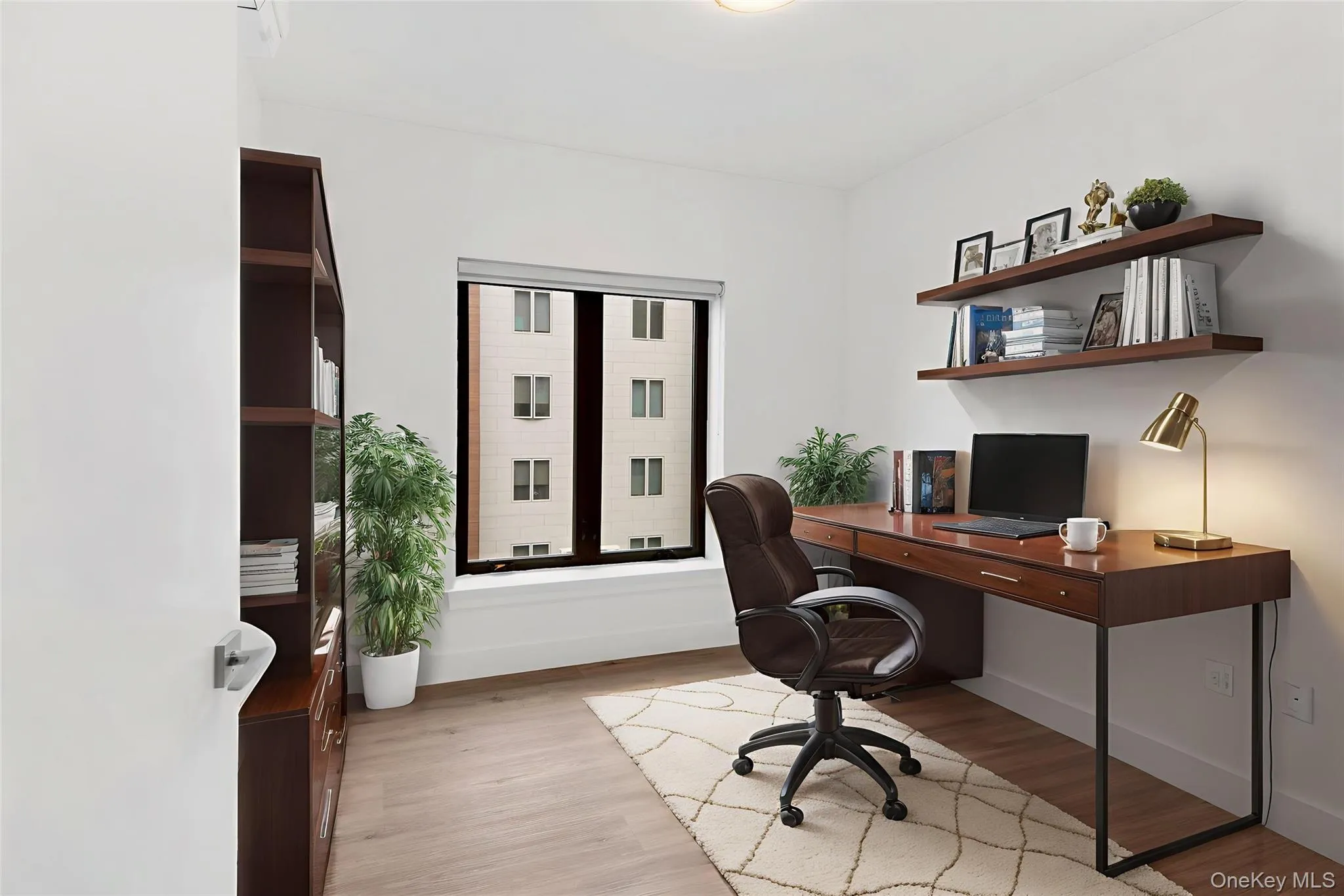 Office area with light wood finished floors Office area with light wood finished floors