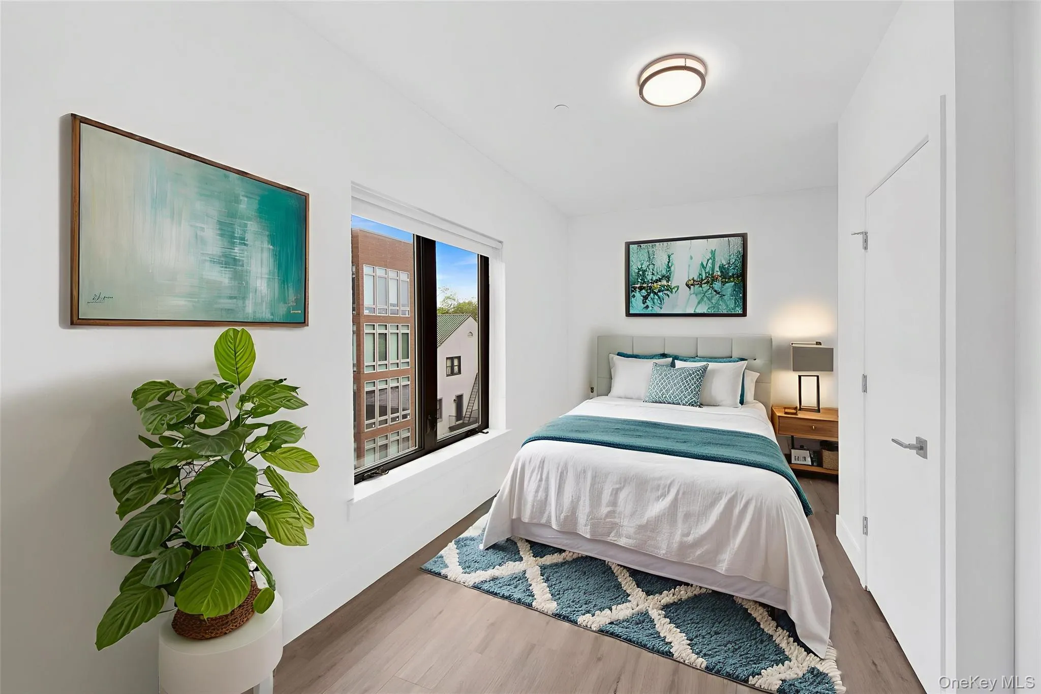 Bedroom with wood finished floors Bedroom with wood finished floors