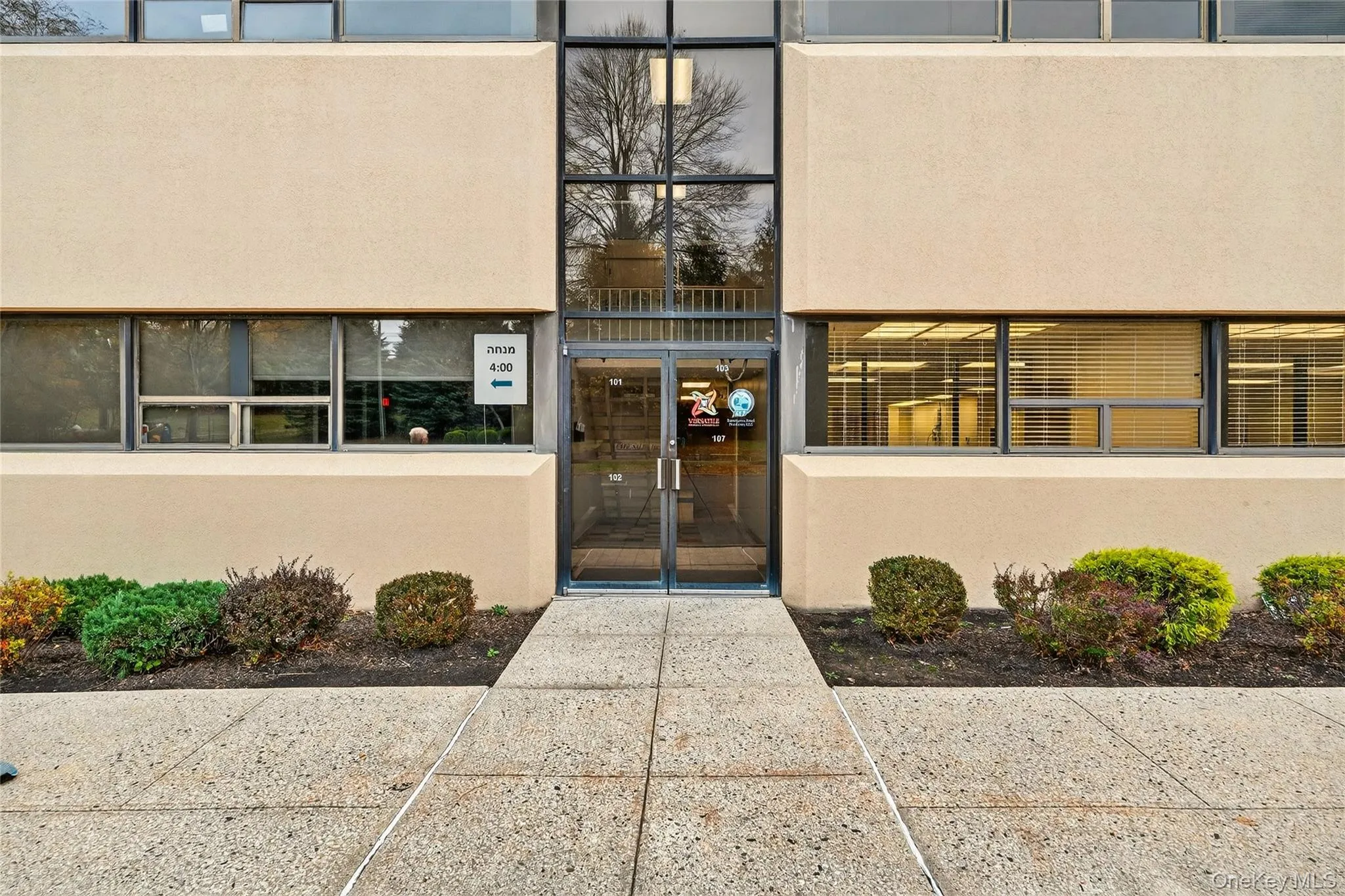 View of exterior entry with stucco siding View of exterior entry with stucco siding
