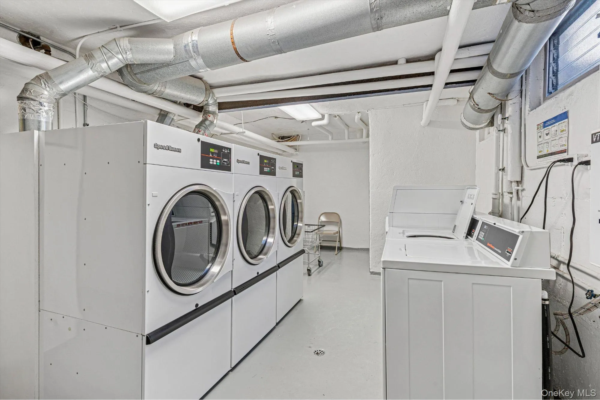 Laundry area featuring washing machine and dryer Laundry area featuring washing machine and dryer
