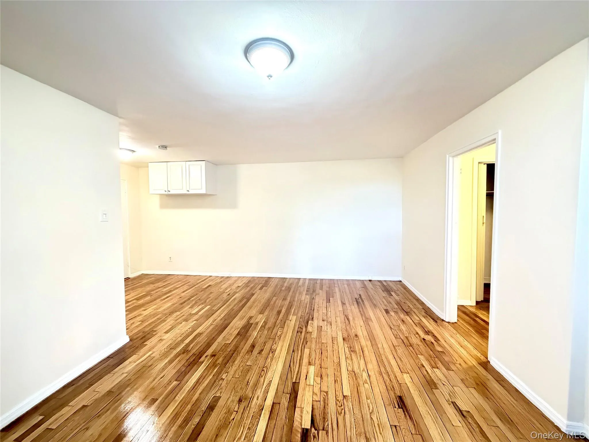 Spare room with light wood-type flooring Spare room with light wood-type flooring