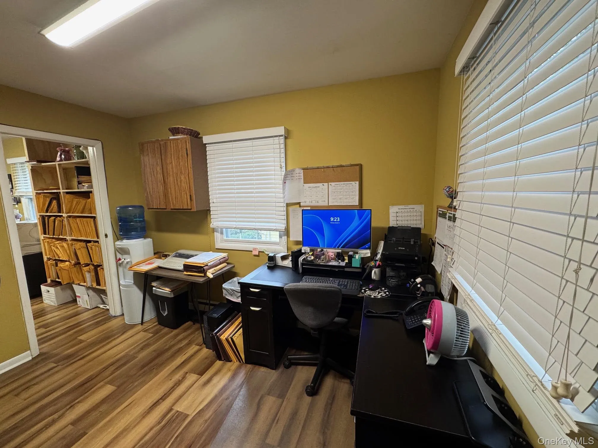 Office featuring dark wood-style floors Office featuring dark wood-style floors