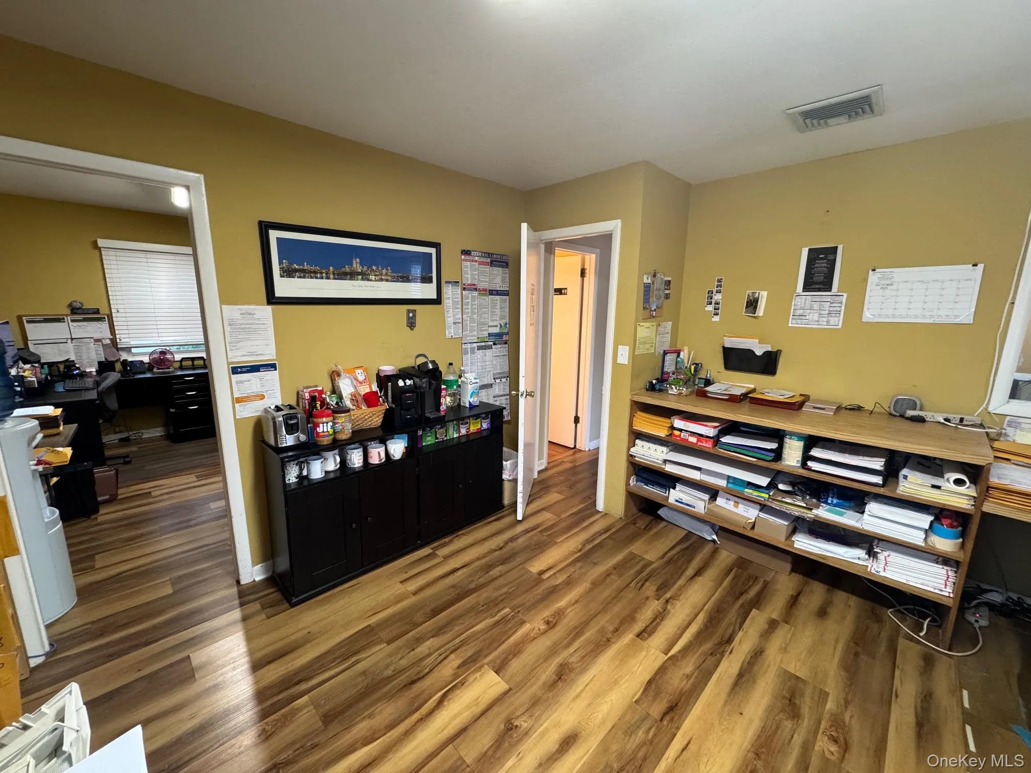 Office area featuring dark wood-style floors Office area featuring dark wood-style floors