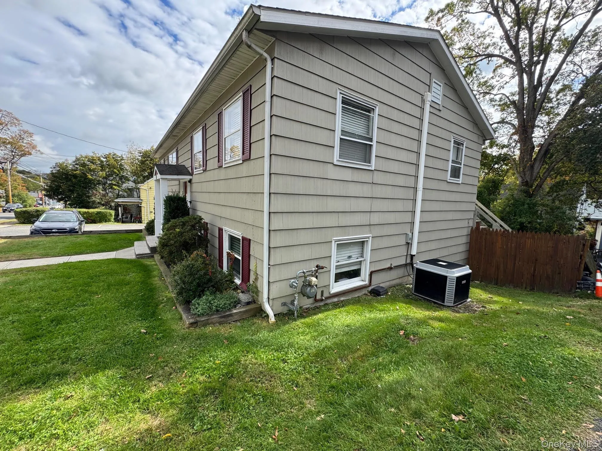View of exterior featuring a central air conditioning unit View of exterior featuring a central air conditioning unit