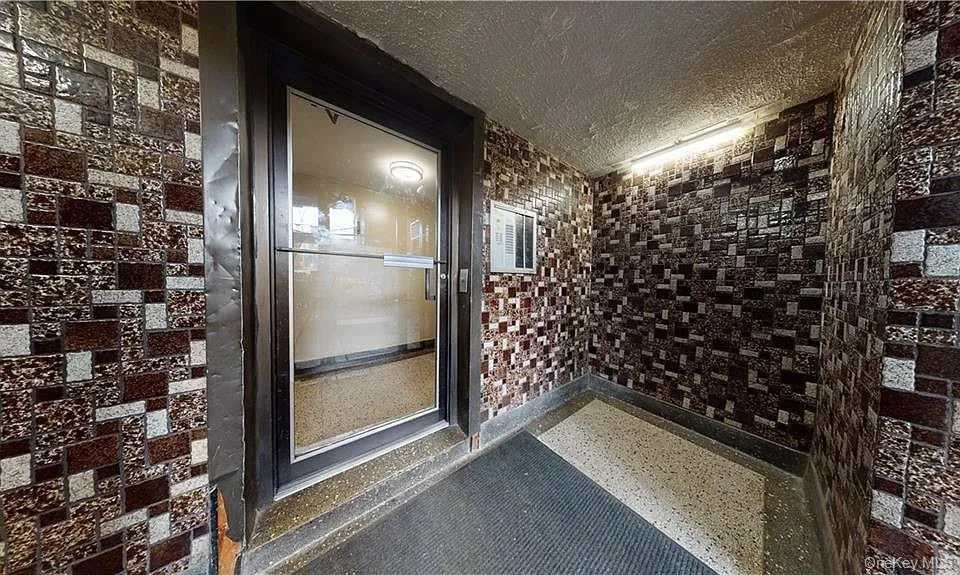 Wine cellar featuring a textured ceiling Wine cellar featuring a textured ceiling