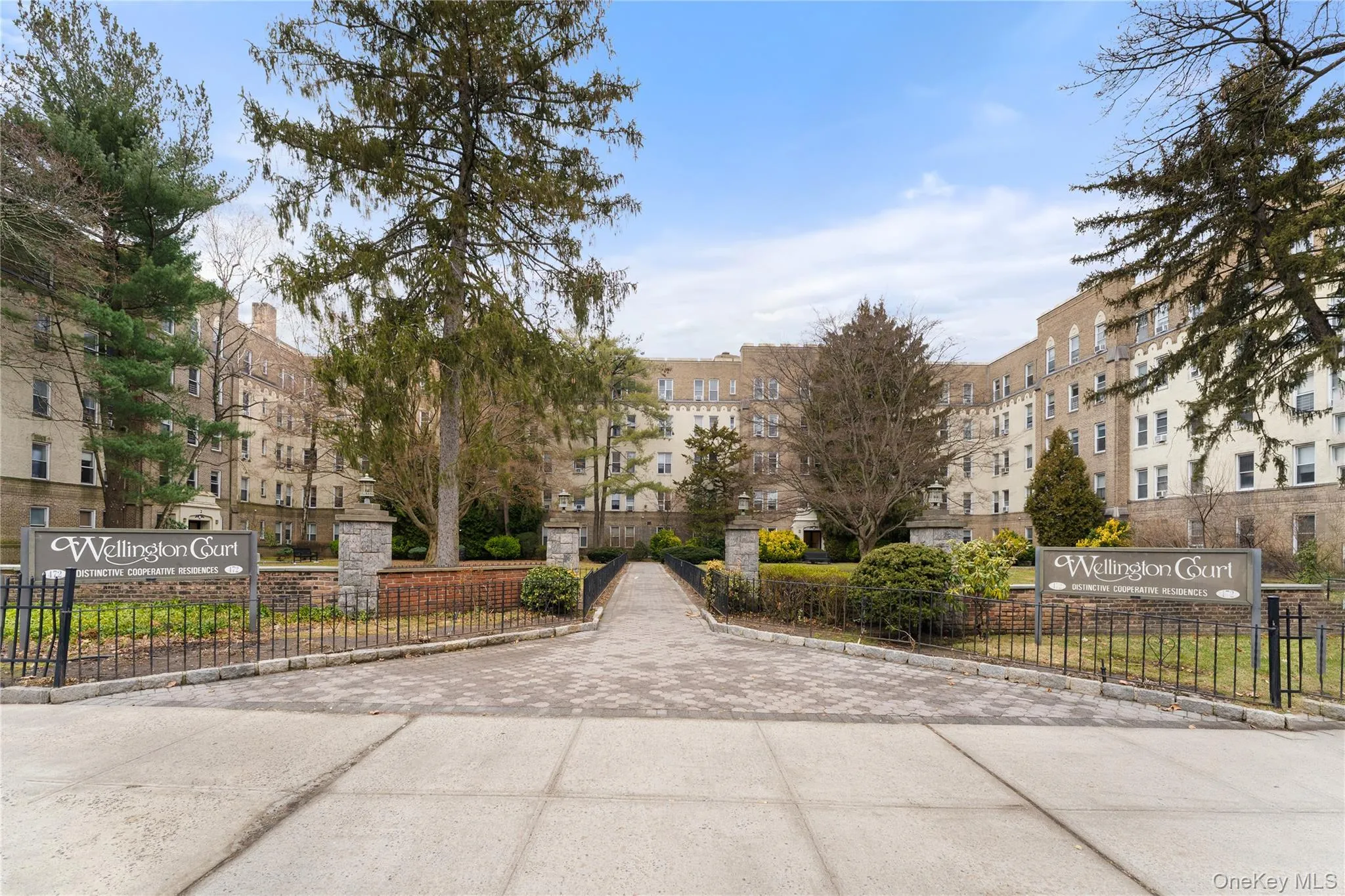 Beautiful, stately buildings with landscaped courtyard Beautiful, stately buildings with landscaped courtyard
