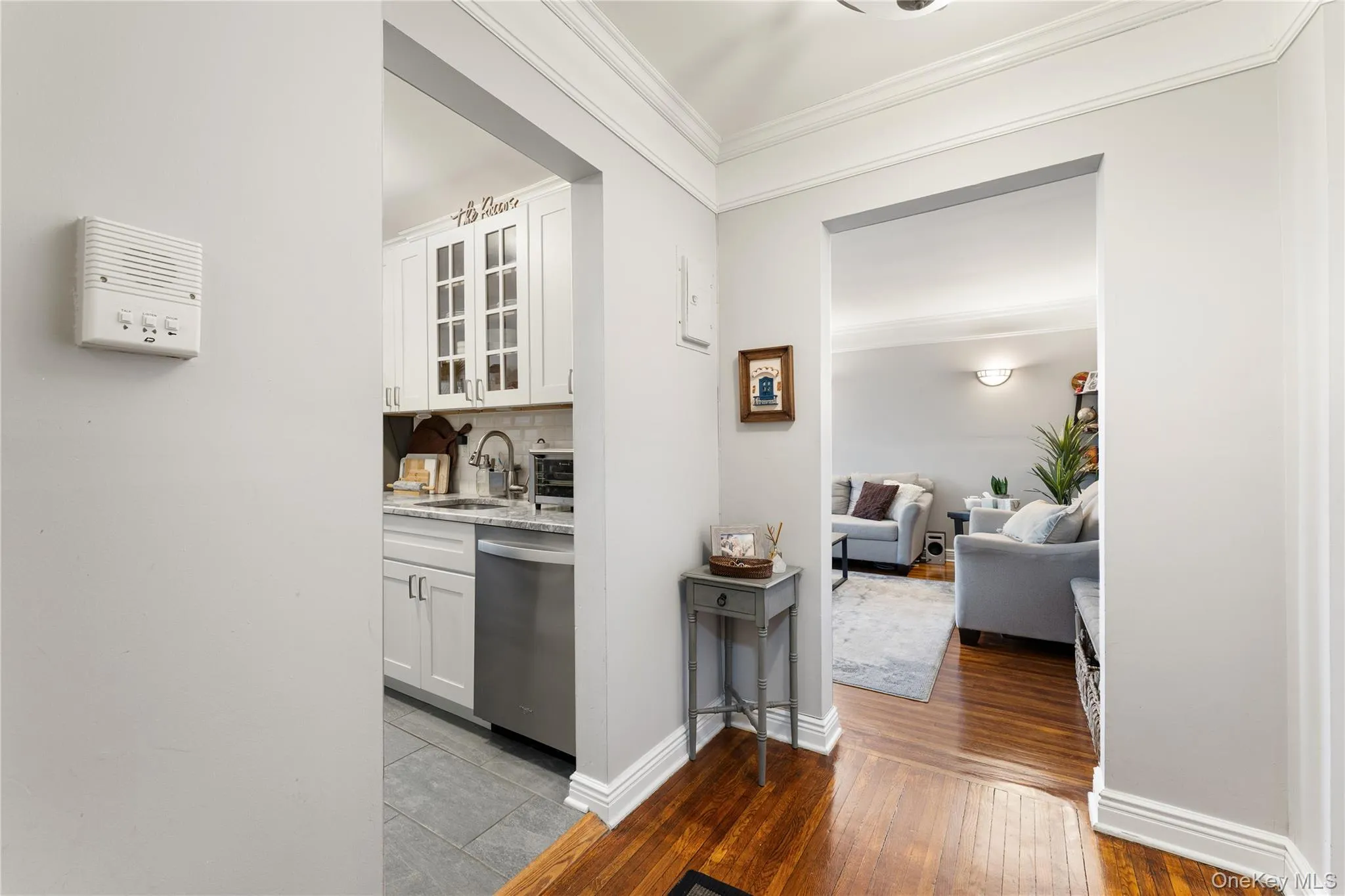 Spacious foyer with entrances to kitchen and living room Spacious foyer with entrances to kitchen and living room