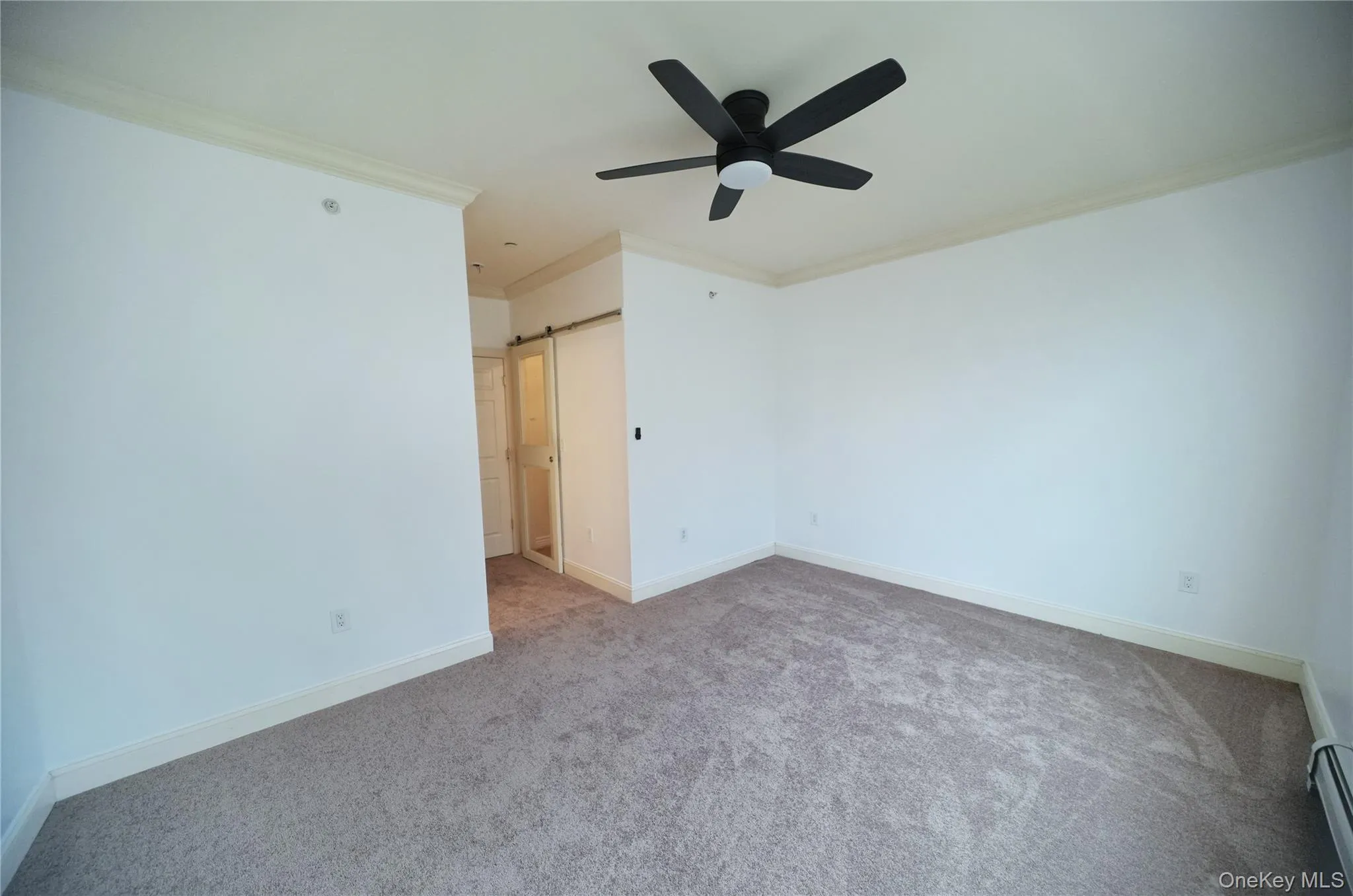 Spacious primary bedroom suite w/ en suite bathroom and walk-in closet. Spacious primary bedroom suite w/ en suite bathroom and walk-in closet.