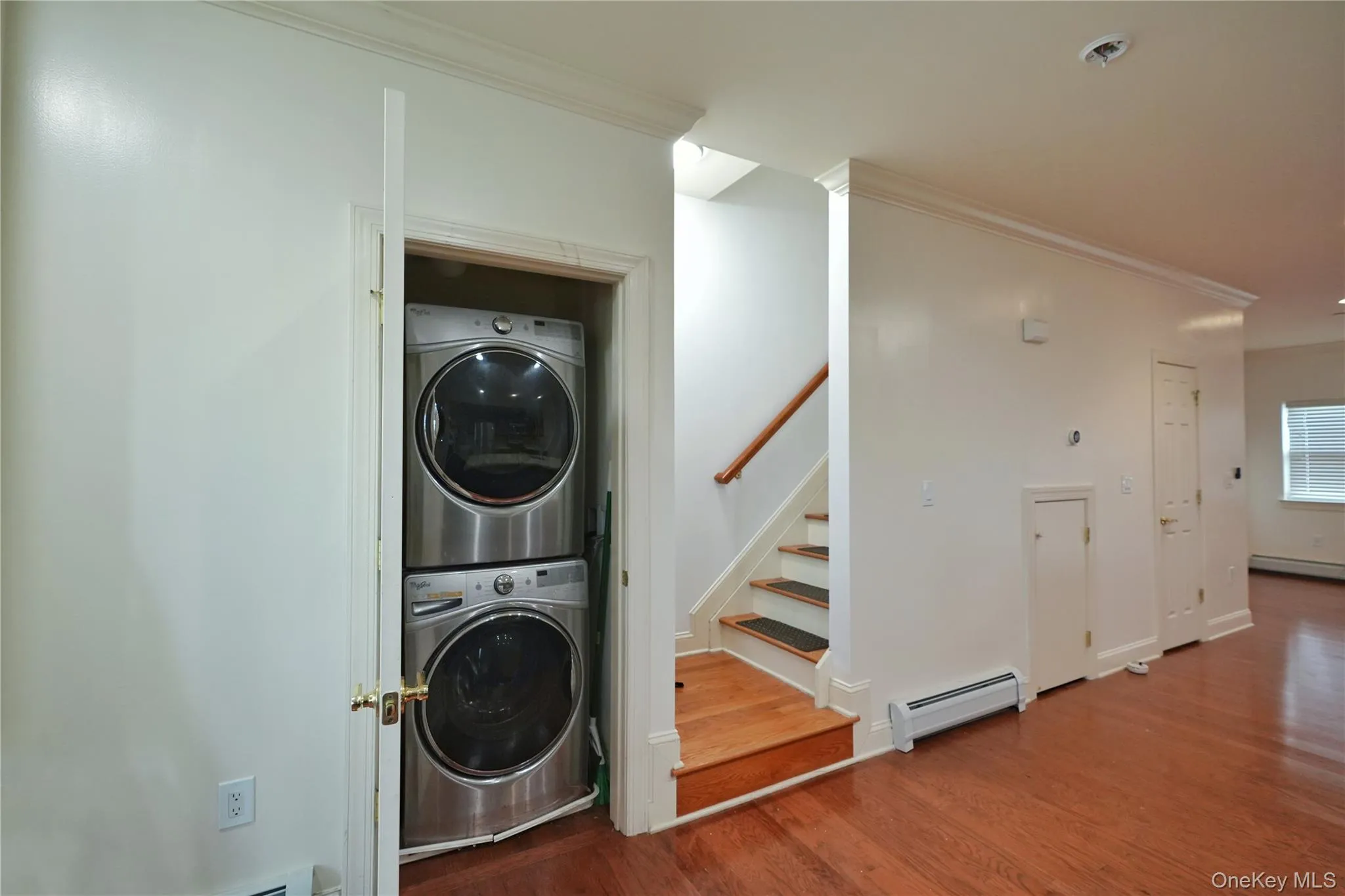 1st floor laundry at bottom of the stairs, leading to bedrooms. 1st floor laundry at bottom of the stairs, leading to bedrooms.