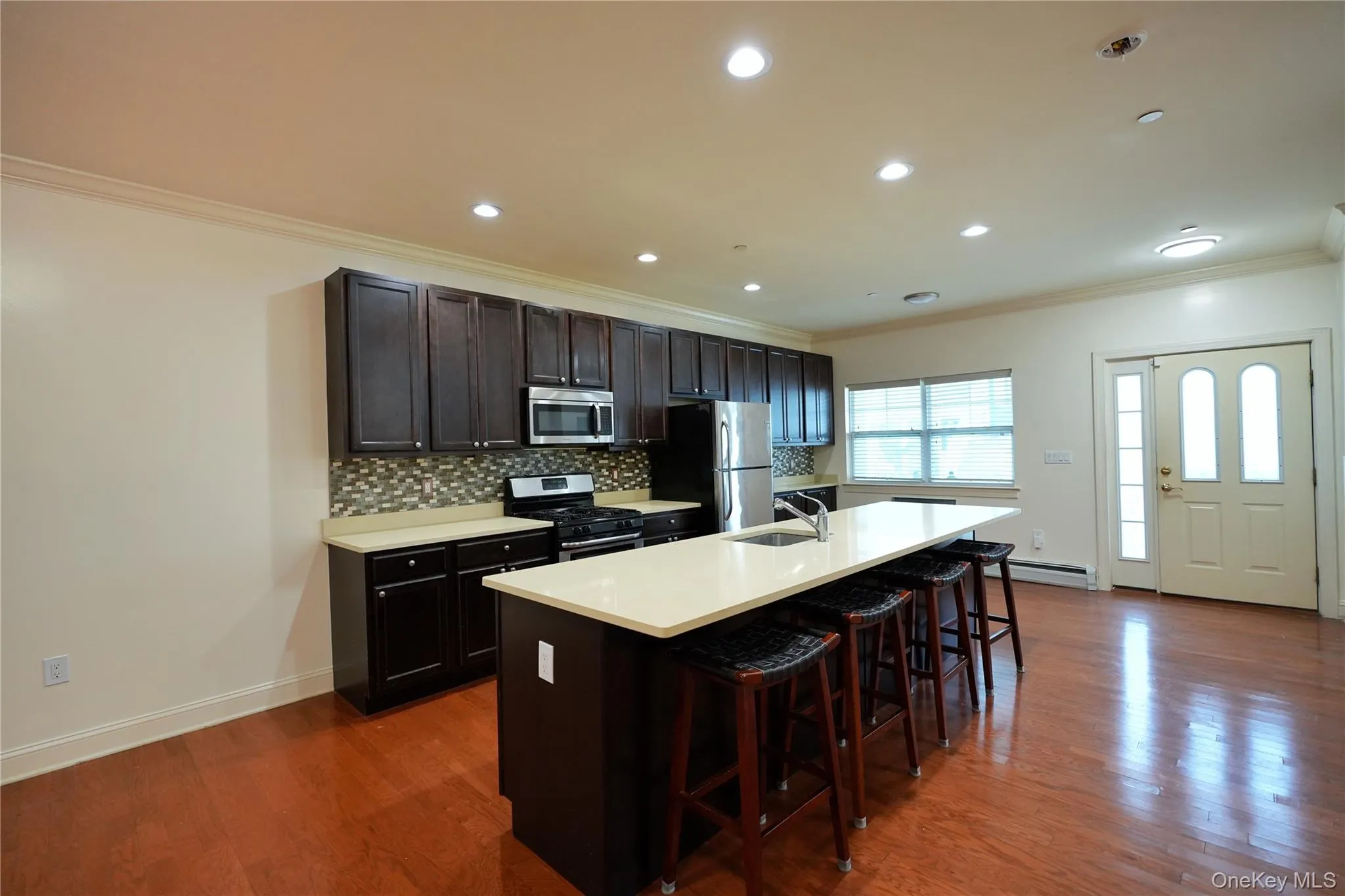 Large kitchen island w/ four stools Large kitchen island w/ four stools