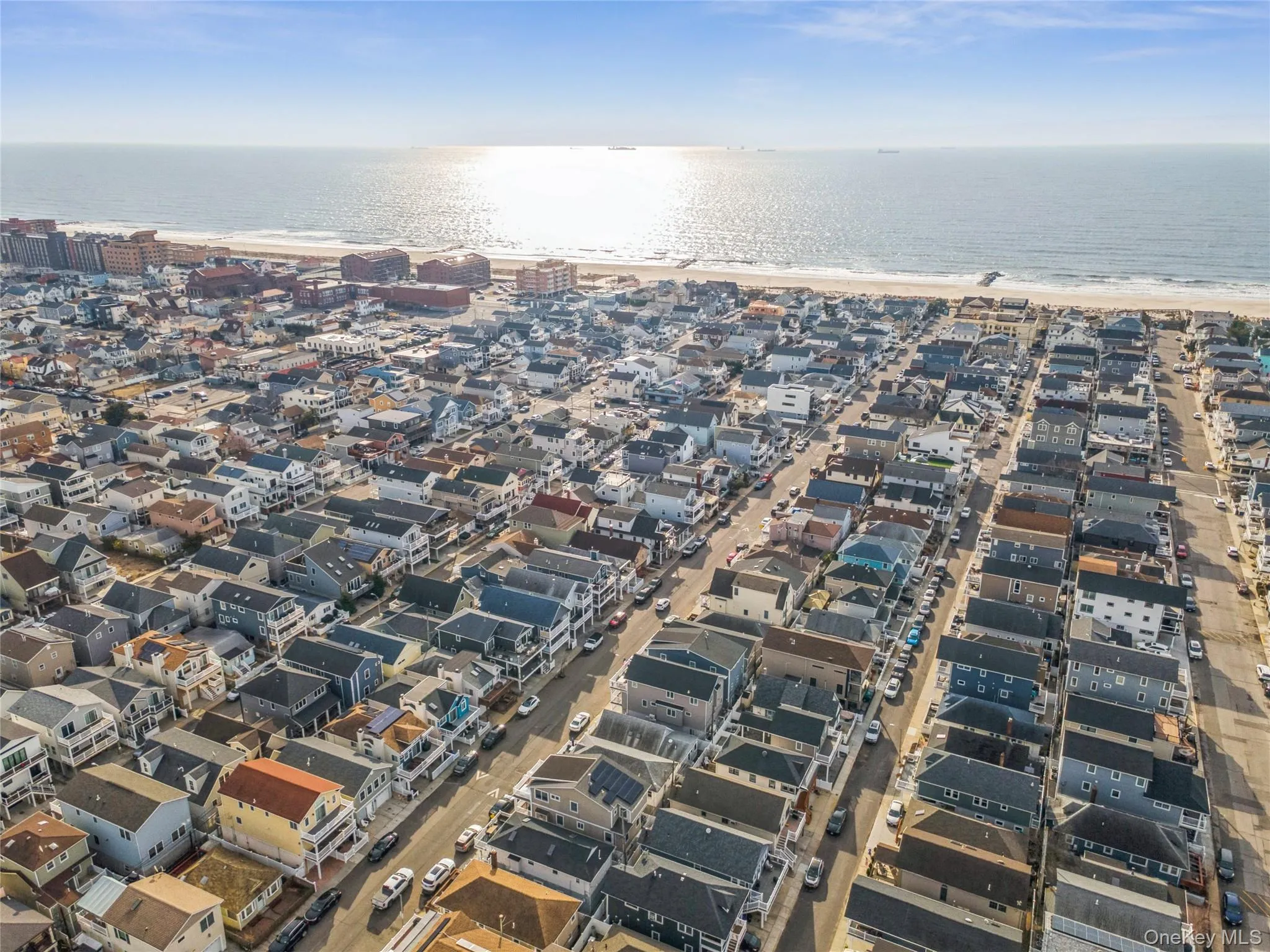 Aerial view of property's location with expansive beach Aerial view of property's location with expansive beach