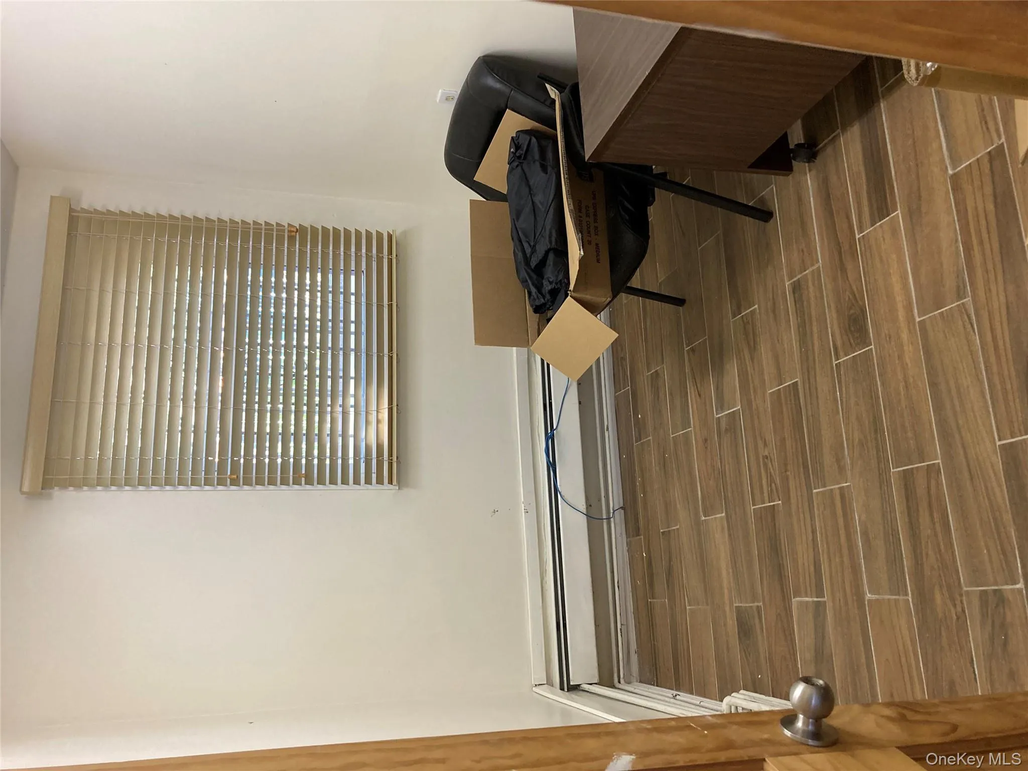 Living area featuring wood finished floors Living area featuring wood finished floors