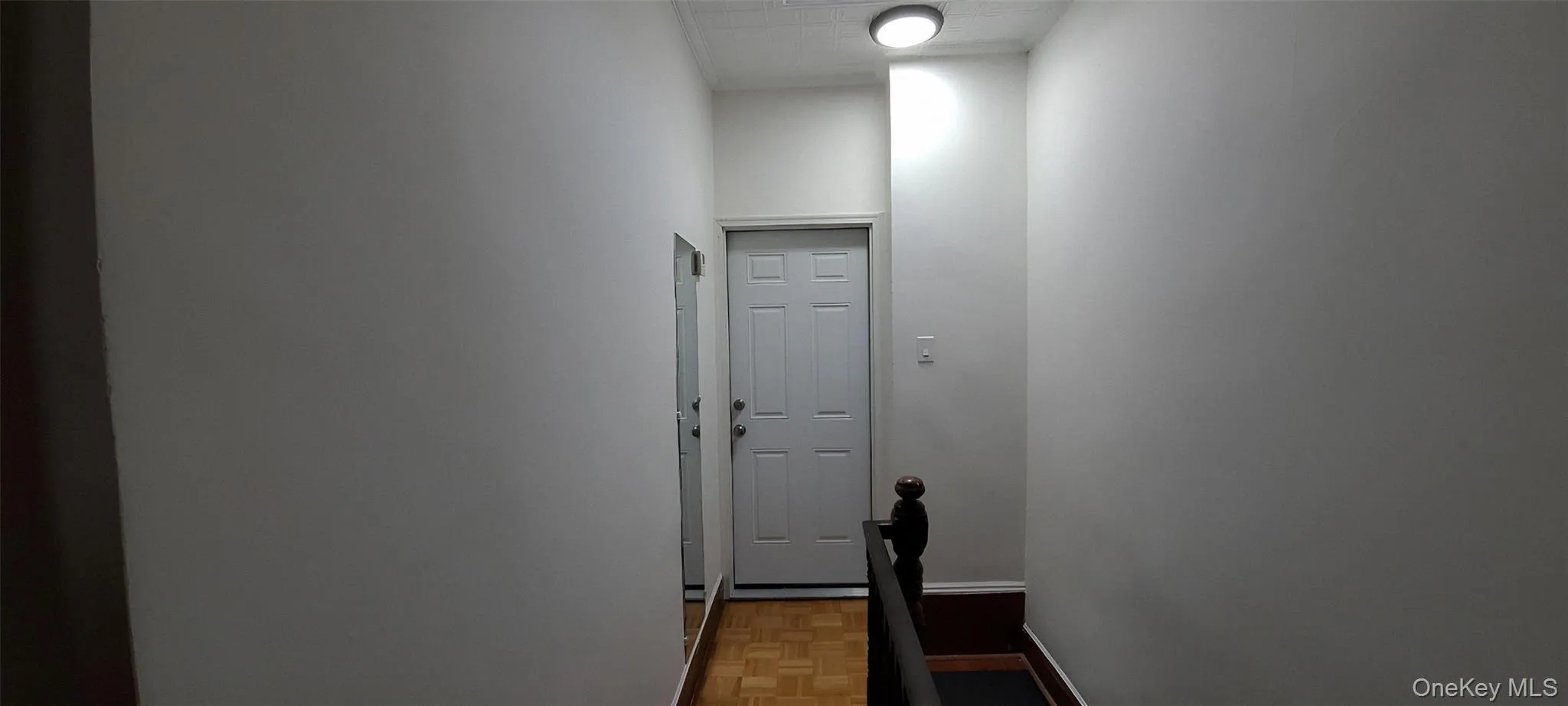 Hallway featuring baseboards Hallway featuring baseboards