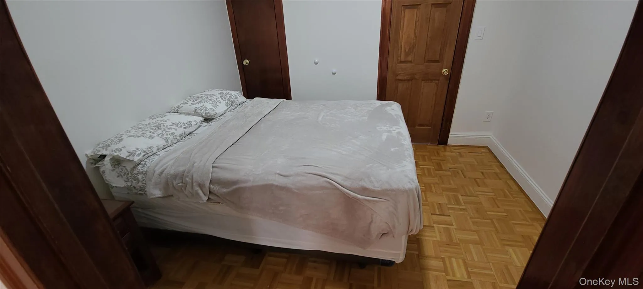 Bedroom with baseboards Bedroom with baseboards