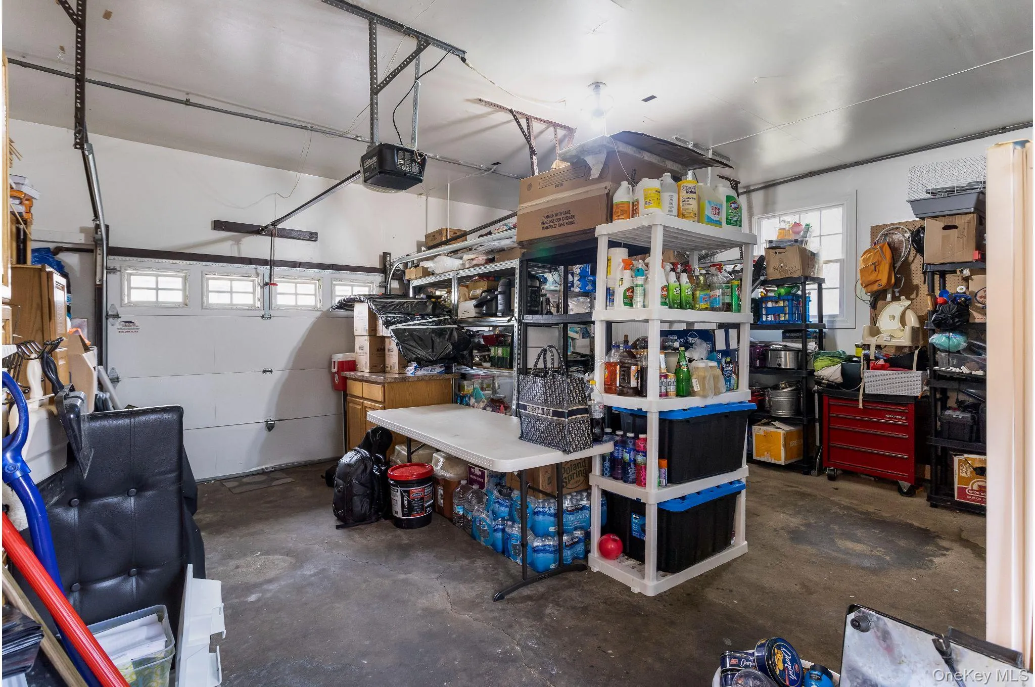 Garage with a garage door opener Garage with a garage door opener