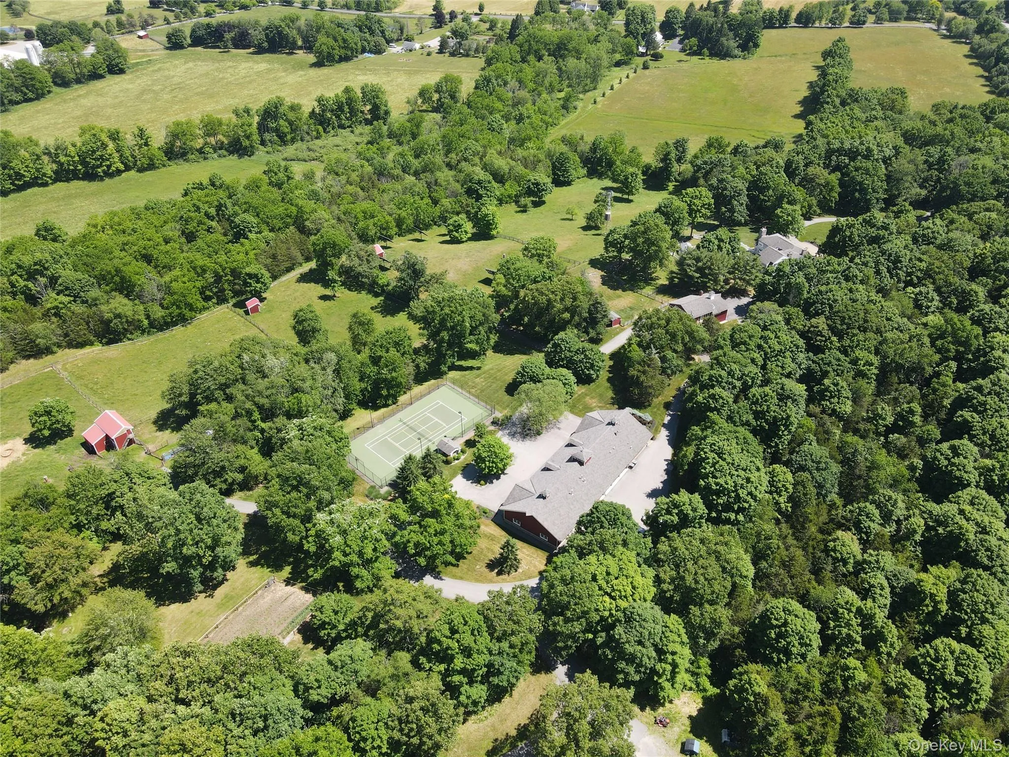 Property aerial showing residence and outbuildings Property aerial showing residence and outbuildings