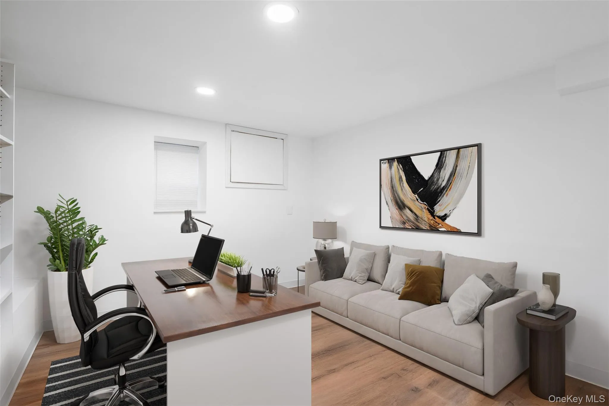 Virtually staged office area with hardwood / wood-style flooring Virtually staged office area with hardwood / wood-style flooring