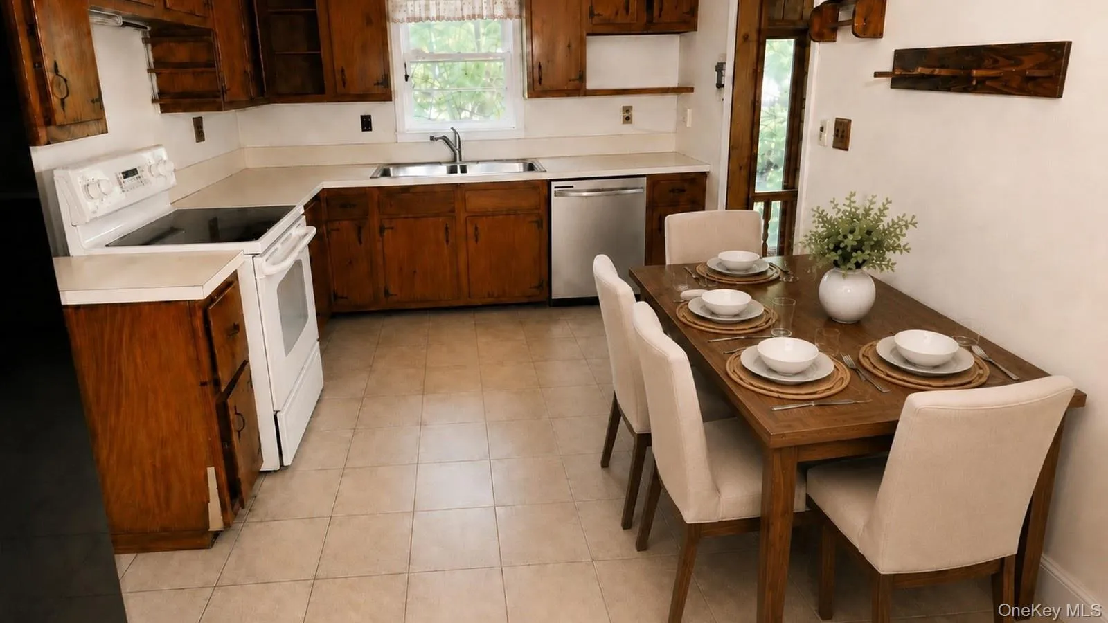 Virtually staged real estate listing photo showing the eat-in kitchen at 9 Sheep Pasture Lane in Huntington, NY,11743 with wood cabinets, dining table, four chairs, and place settings. Virtually staged real estate listing photo showing the eat-in kitchen at 9 Sheep Pasture Lane in Huntington, NY,11743 with wood cabinets, dining table, four chairs, and place settings.