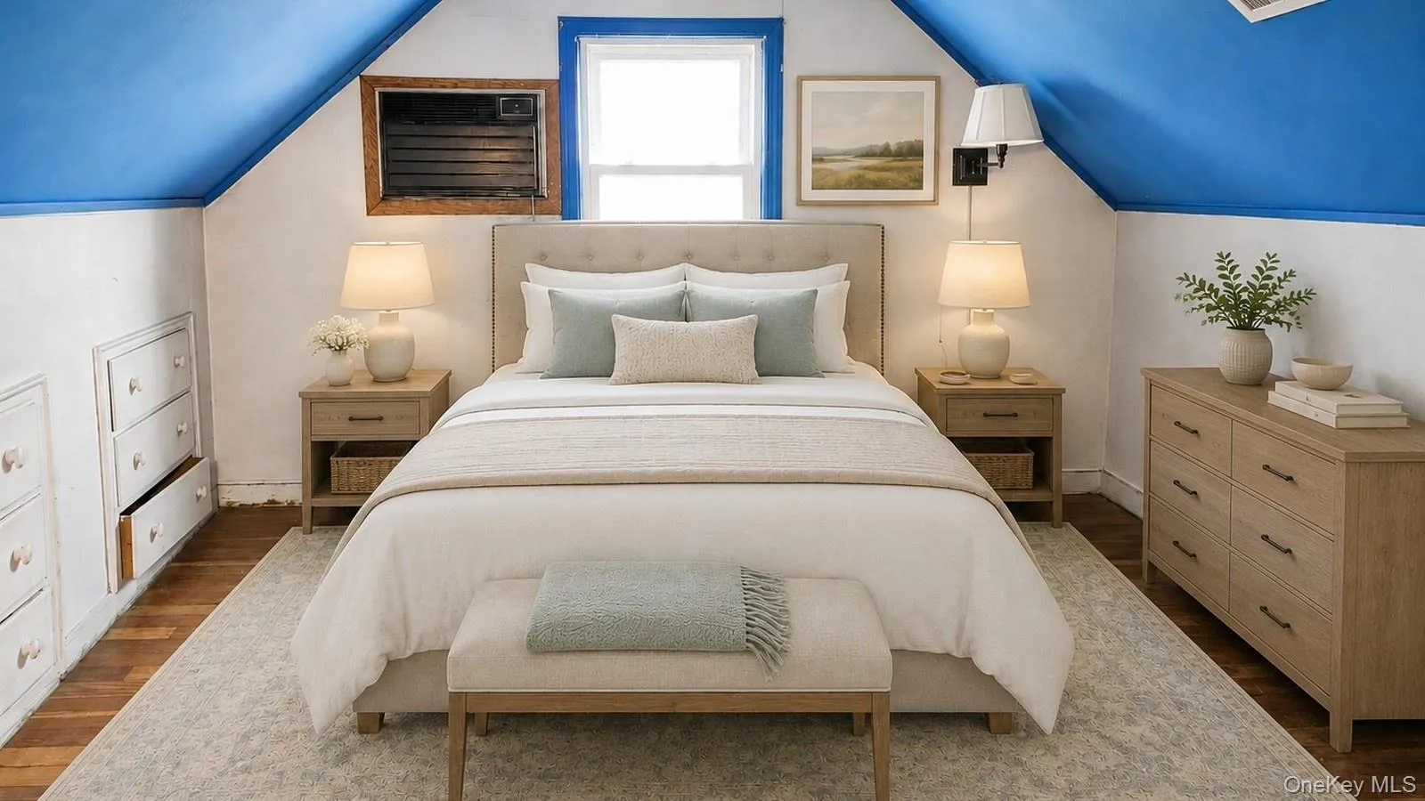 Virtually staged real estate listing photo showing the attic bedroom at 9 Sheep Pasture Lane in Huntington, NY 11743 with a blue sloped ceiling and neutral bedroom furnishings. Virtually staged real estate listing photo showing the attic bedroom at 9 Sheep Pasture Lane in Huntington, NY 11743 with a blue sloped ceiling and neutral bedroom furnishings.