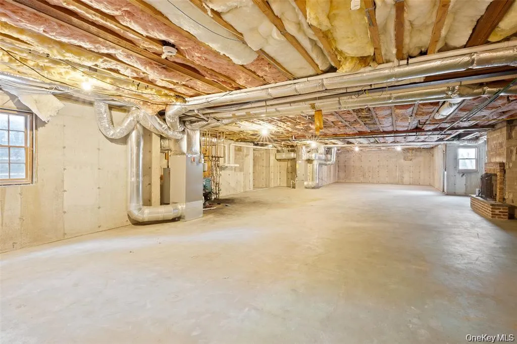 Below grade area featuring heating unit Below grade area featuring heating unit